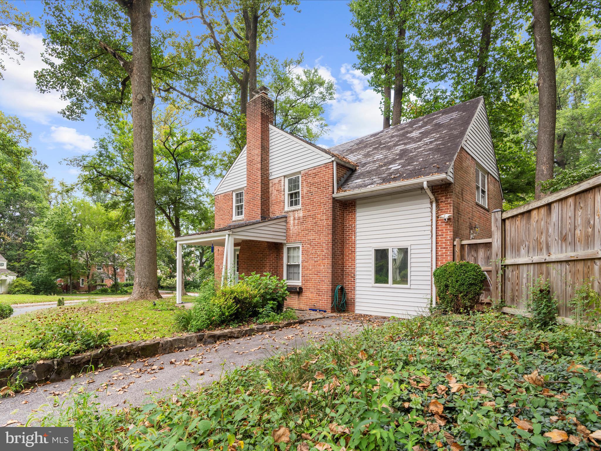 Charming Brick Home with Spacious Backyard & Modern Upgrades! Welcome to this beautifully maintained brick home, full of character and modern conveniences. Set on a generous lot with a huge, fully fenced backyard, this property offers the perfect balance of privacy, mature trees, and space to relax or entertain. Step inside to discover a gorgeous eat-in kitchen featuring granite countertops, ceramic tile flooring, a double sink, stainless steel appliances, a gas range, and a brand-new built-in microwave (2025). Recessed lighting keeps the space bright and inviting. The main level boasts rich hardwood floors, more recessed lighting, a formal dining room, and a cozy family room with custom built-in shelving. You’ll love the updated full bath on this level, finished with ceramic tile and thoughtful touches throughout. Stunning arched doorways add timeless charm and character. Recent updates include a radon mitigation system, fresh interior paint, and a new electric panel, giving you peace of mind for years to come. This home is the perfect blend of classic details and modern updates. Welcome Home!