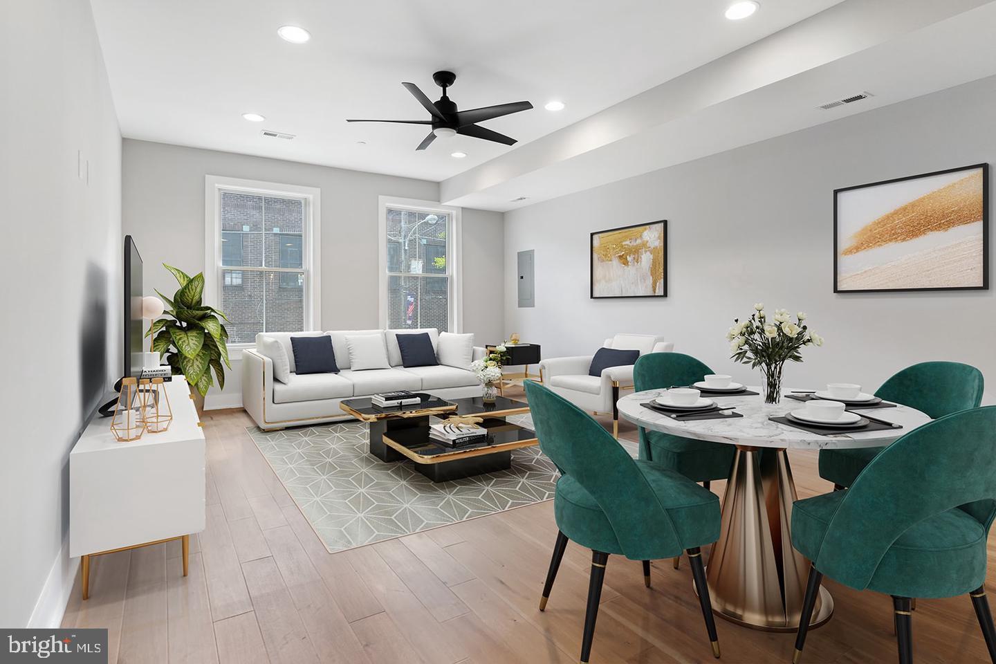 Step into the vibrant allure of Passyunk Place - an exhilarating collection of newer constructed condos nestled at the heart of Passyunk Square. These thoughtfully designed units are elegantly bi-level, boasting an open floor plan that invites abundant natural sunlight to fill the spaces. Immerse yourself in the rich features that define these residences, from the expansive wide-plank hardwood floors that extend a warm welcome to the custom kitchen cabinets that marry style with functionality.
Indulge in the luxury of quartz countertops that grace the kitchen, while recessed lighting dances overhead, setting the perfect ambiance for any occasion. A comprehensive home entertainment package and the convenience of a Ring Doorbell ensure your modern lifestyle needs are effortlessly met.
Cross the threshold into the main floor, where a living area seamlessly melds with the kitchen, creating an inviting space for both relaxation and culinary creativity. A full bathroom and a well-appointed bedroom complete this level, providing comfort and convenience in equal measure. Ascend to the second floor, where two generously proportioned bedrooms await, each accompanied by its own en-suite bath. The harmonious fusion of design and practicality is undeniable.
Crowning these exceptional units is a private roof deck that unveils panoramic views, a sanctuary where you can unwind and take in the enchanting surroundings. Beyond the confines of your abode, you'll discover the joy of a highly walkable neighborhood, with local restaurants, boutiques, and parks all within effortless reach.
In essence, Passyunk Place is more than just a residence; it's a testament to modern living at its finest. Don't miss your chance to be part of this dynamic community, where comfort, style, and convenience converge seamlessly. Your urban oasis in Passyunk Square awaits.