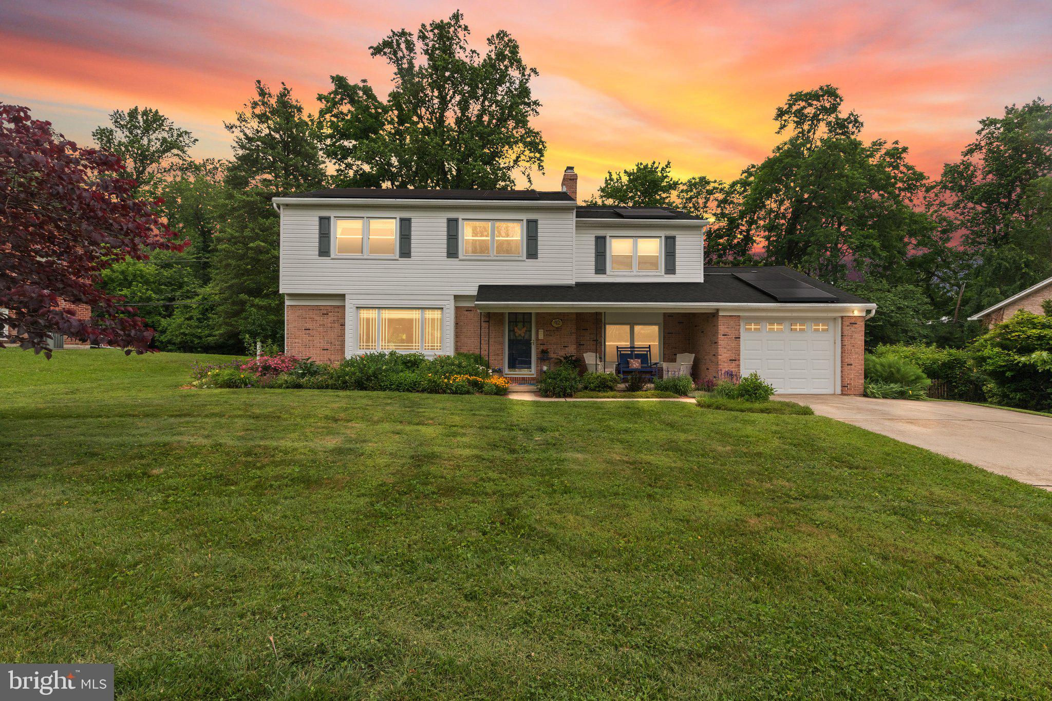 Nestled on nearly a 1/2 acre in the sought-after Homestead Village neighborhood—just a half-mile from the park and under a mile from grocery stores, the library, school, and local pubs—412 Linwood offers the perfect blend of convenience, comfort, and energy-smart living. This beautifully maintained 4-bedroom, 2½-bath home with garage features a welcoming front porch framed by vibrant flower beds and an incredible backyard—ideal for morning coffee or evening conversations.
Inside, gleaming hardwood floors flow across both the main and upper levels (with additional hardwood preserved beneath select carpet and vinyl). The updated kitchen, remodeled in 2010, features slow-close cabinetry, granite counters, stainless-steel appliances, and recessed lighting. Just off the kitchen, a flexible office space with built-in desks keeps work and life close at hand. The adjoining addition is a true standout, with cathedral ceilings and abundant natural light pouring through two sliding doors and a wall of windows—opening onto a 2020 Trex deck with a charming fountain and expansive backyard bordering The John Carroll School playing fields.
The family room, refreshed in 2020, features a cozy gas fireplace, while a stylishly updated powder room (2015) and a main-floor laundry room with wash sink add everyday ease.
Upstairs, the spacious primary suite includes recessed lighting, a generous walk-in closet with pocket door, and a tiled bath with a deep soaking tub and separate shower (2013). A second full bath, remodeled in 2015, serves the remaining bedrooms.
Additional features include vinyl fencing, a built-in backyard shed, abundant basement storage with built-in shelving, and a dedicated workshop area with a sturdy workbench. A one-car garage with tons of storage, and an extra-wide parking pad provide space for vehicles, boats, or RVs—no HOA restrictions here!
System updates offer peace of mind and SERIOUS savings: Roof (2013), windows and interior doors (2005), gas water heater (2023), and ground-loop geothermal heating and cooling (installed 12/2019). Two solar panel systems (2014 & 2019) further reduce monthly energy costs (avg total gas and electric bills $144/mo, available upon request).
With timeless upgrades, modern energy efficiency, and a location that can’t be beat, 412 Linwood is truly move-in ready. Welcome home!