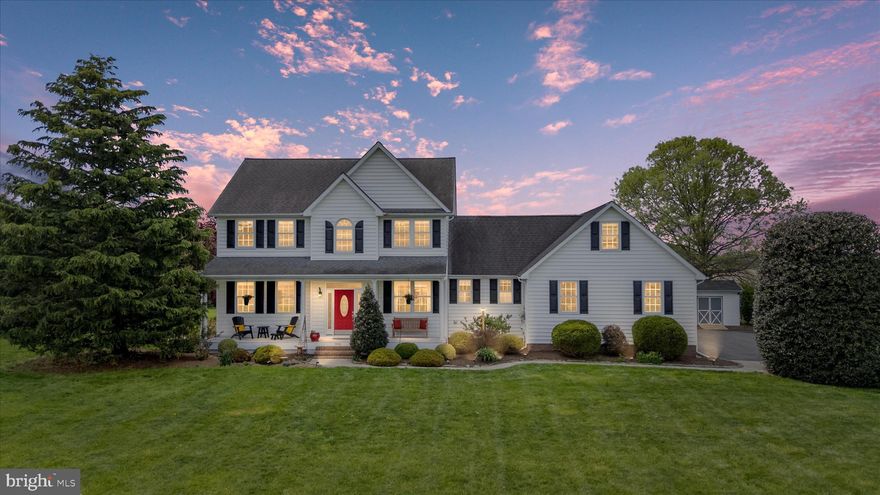 Open House, Sunday, 4/26, 11am-2pm. Welcome to 988 White Marsh Road—where privacy, space, and effortless elegance come together. This energy-efficient home features owned (not leased) solar panels, offering long-term savings and sustainability from day one.

Tucked away on 1.37 unrestricted acres of serene countryside, this exceptional residence offers a rare opportunity to own a true private retreat in Centreville. Surrounded by nature and open skies, the setting is peaceful, quiet, and completely your own—yet just minutes from everything.

Inside, over 2,600 square feet of thoughtfully designed living space unfolds with a sense of warmth and sophistication. The heart of the home is a stunning family room anchored by a propane fireplace, where natural light and inviting finishes create the perfect atmosphere for both quiet evenings and entertaining. The adjoining kitchen is equally impressive, featuring  stainless steel appliances, a stylish tile backsplash, and a bright dining area, all designed to bring people together.

A formal dining room and additional living space offer flexibility for hosting, while the mudroom, laundry room, and half bath ensure everyday living remains seamless and functional.

Upstairs, the primary suite serves as a peaceful sanctuary, complete with a spa-like en-suite bath and an expansive walk-in closet. Three additional bedrooms and a full bath provide comfort for family or guests, while the bonus room over the garage offers endless possibilities—whether a private office, fitness space, or media lounge.

Outdoors, the lifestyle truly shines. Sip your morning coffee on the welcoming front porch, or unwind on the maintenance-free rear deck overlooking your expansive, private backyard. With ample space to garden, entertain, or simply enjoy the quiet beauty of the Eastern Shore, this property offers a level of privacy that is increasingly rare.

This home has been meticulously enhanced with thoughtful upgrades, including fresh interior paint (2026), a repaved driveway (2026), updated appliances, a new heat pump (2024), and owned solar panels, 42 in total, that combine sustainability with long-term savings. Additional features such as a whole-house water filtration system, Thompson Creek windows (2021), and an updated sliding glass door (2021) further elevate the home’s comfort and efficiency.

Located just minutes from Historic Centreville, the Centreville Wharf & Public Landing, parks, and local dining—and within easy reach of the Bay Bridge—this home delivers a balance of seclusion and convenience.

A perfect blend of privacy, comfort, and elegance—988 White Marsh Road is where your next chapter begins.