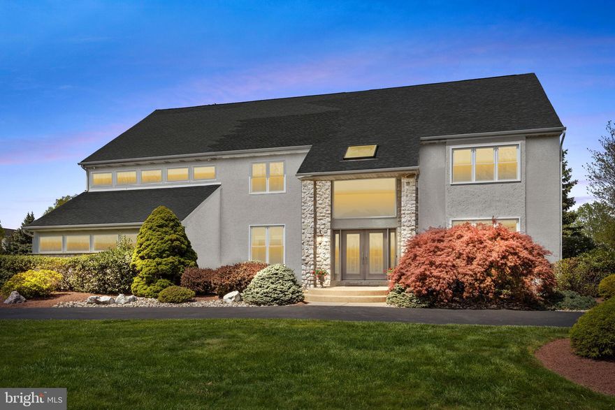 Situated on a magnificent 1 acre lot this remarkable 7000+ square foot residence has it all! Nothing overlooked, it offers a spectacular entertainer’s floor plan inside and out. Loving owners have spent over $100K in upgrades in the past few years. From the road you will appreciate the impressive 2 story stone pillared entryway, freshly repaved circular driveway, renewed gray exterior, mature landscaping, attractive double doors and three car garage. Once inside you will be greeted by an open foyer and admire the lovely views from the fresh new windows.  Off the foyer is a spacious study with a full bath which could be utilized as a bedroom. The gracious living room is to the right and has 9 foot ceilings, lovely triple window and recessed lighting. Dinner parties will be a delight in the impressive formal dining room featuring a lovely chandelier, recess lighting and custom built-ins with table seating for up to 20. The tastefully designed kitchen boasts of a massive granite island and is complemented by an abundance of rich cherry wood cabinetry, Italian tile backsplash & pendant lighting. Appliances include french door refrigerator, sleek range hood, built-in microwave, wine refrigerator & double oven, Adjacent is a sky-lighted breakfast room with an attractive chandelier, Anderson sliding glass door and large windows so you can enjoy amazing views of the picture perfect backyard. The impressive backyard is embraced by black metal fencing and it is a “Wow”. It is a wonderful spot to relax from the hustle and bustle of today’s busy lifestyle. Take a refreshing dip in the enticing free form pool with new azul tiling, coping and masonry. Relax in the spa, or hang out at the granite bar area overlooking a fountain. The extensive hardscaping includes beautiful pavers, granite bar, and circular bench.  Also includes Lifetime play yard with double slides. Off the kitchen is a grand family room boasting soaring ceilings, marble fp with recent Heat glo gas insert, a bar, french sliding doors and stairways to 2nd and 3rd levels. A mudroom completes this level. On the second floor, you will be greeted by a double door entry into owner’s suite with a sky high cathedral ceiling, deep silled triple window, and wardrobe welcoming his and her closets.The main bath is sky-lighted, has been refreshed with stunning Quartz counter, crisp white cabinetry has separate marble shower with recent glass doors, marble flooring and deep jetted tub. Second bedroom is a full en suite. Bedrooms 3 and 4 share a Jack and Jill bath each with their own private half bath. A convenient full sized laundry room and separate den is included on this level. The third level loft has a full bath, built-in bookshelves and offers flexible options for an au pair suite, gaming or 5th bedroom.The basement is awesome, thoughtfully designed and comes fully equipped. Features a large wet bar with refrigerator and has many areas to entertain and play. Media room has multi levels for theater seating and includes speakers and a large flat screen tv. Also has a separate workout room with equipment and hobby room. A double wine storage closet with french doors to easily display your collection, a  powder room and front and back stairway access finish off this space. All topped off by a fantastic, convenient location in the acclaimed Council Rock School District. A stone throw from the bus stop, and is within walking distance to the Northampton Municipal Park where you can enjoy summer concerts, playgrounds, softball, soccer, beach volleyball, basketball, hockey and has picnic areas. This exceptional residence is a wonderful place to call HOME. Build your memories today and end your search here.