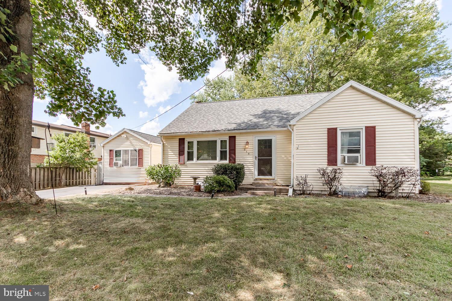 Charming and versatile home in desirable Houserville, just a short stroll from Spring Creek Park! This well-maintained property offers 4–5 bedrooms and flexible living space to meet a variety of needs. On the main level, you'll find two bedrooms and a full bath, plus an additional room off the breezeway that can serve as a bedroom, office, or family room. The large, eat-in kitchen is a standout feature with ample space, a stainless steel refrigerator, and double oven—perfect for gathering and entertaining.
Upstairs, two more rooms and a convenient half bath add to the layout's flexibility. The lower level includes two finished rooms and a walk-out basement, ideal for recreation, guests, or hobbies. Recent updates include newer windows, a newer roof, and a french drain with sump pump system around the interior foundation, giving peace of mind for a dry basement.
Enjoy a flat, fenced-in backyard that’s great for pets, play, or gardening. Just minutes from downtown State College, I-99, shopping, restaurants, and Penn State, this home offers both character and convenience in a prime location.