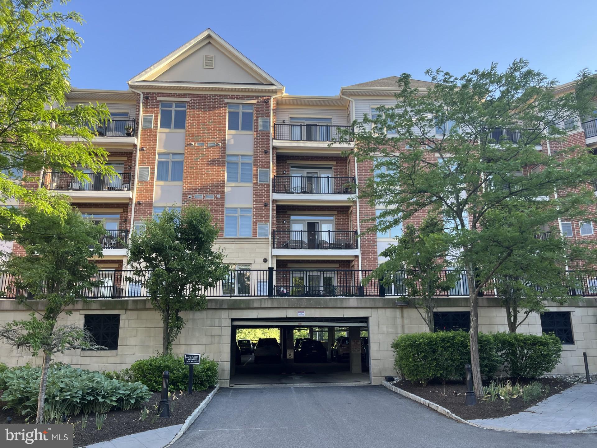 This luxury one-bedroom unit with a loft offers the potential to create an additional room, whether as a guest space or a home office. It features a stunning open floor plan and breathtaking views of the pond and woods.
The living room, with its open layout, includes a balcony that provides a spectacular view. This unit has one garage parking space, a 24-hour lobby attendant, access to an indoor pool with a whirlpool, a fitness center, and secured garage parking.
All utility bills, including water, gas, and electricity, are covered. The landlord pays around $950.00 monthly for the condo fee, including all furniture, a TV, plates, and a desk. This unit is ready for you to move in!