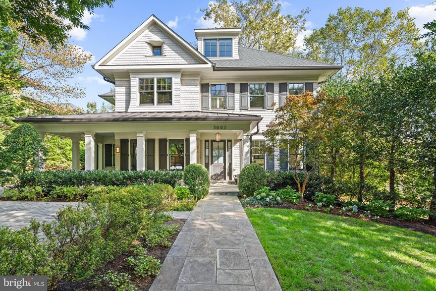 This custom-designed residence by Jim Gibson in the highly desirable Somerset neighborhood exemplifies unparalleled design and craftsmanship. The house features a wonderful open floor plan, offering generously scaled rooms illuminated by an abundance of natural sunlight. The residence is perfect for entertaining with a wonderful transition between formal rooms and seamless flow from indoors to outdoors. The interior of the home is a testament to luxury and comfort. A gracious entry foyer provides beautiful sightline views to the rear of the home. The elegant living room offers a gas fireplace and the sophisticated dining room, which is directly opposite, caters to formal occasions. The heart of the home is the gourmet chef's kitchen, seamlessly opening to the family room and screened porch, creating an inviting space for both casual and formal gatherings. The marble kitchen has a large center island with breakfast bar seating, abundant cabinetry storage, high-end appliances, a breakfast nook with built-in banquet, and windows overlooking the rear yard and terrace. The family room offers an additional fireplace, built-in cabinetry, floor to ceiling windows, and French doors to the screened porch. There is also the added convenience of a powder room, mudroom, and office on this floor. Upstairs, the impressive primary suite offers a sanctuary of luxury and elegance. The bedroom overlooks the yard below and adjoins a spacious walk-in closet with ample built-ins and an en-suite bathroom with dual vanities and a frameless glass shower. There are four additional bedrooms upstairs, all with their own en-suite bathrooms and walk-in closets. The lower level provides amenities including a wine cellar, a versatile library/recreation room, a state-of-the-art media room, a well-equipped gym, an additional bedroom, and a full bathroom. The flat rear yard is fully fenced and showcases a professionally landscaped garden. The grill and terrace area, surrounded by mature trees and layered plantings, provide a perfect setting for outdoor enjoyment and relaxation. The property also features a garage and additional surface parking. There is also the added benefit of geothermal heating and cooling, a generator, and smart home technology. The house is within close proximity to the Somerset neighborhood parks, pool, basketball courts and tennis. Also, high end shopping, restaurants, and Metro are within walking distance too.