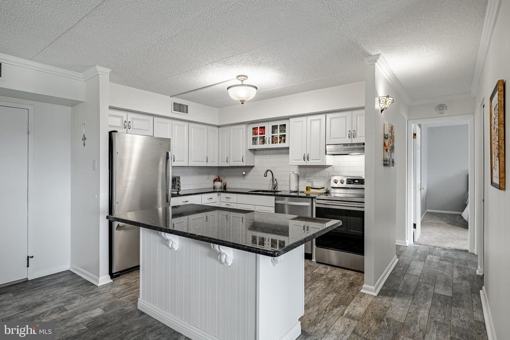 Photo of 10713 Valley Forge Circle #713, KING OF PRUSSIA, PA 19406 (MLS # PAMC2170862)