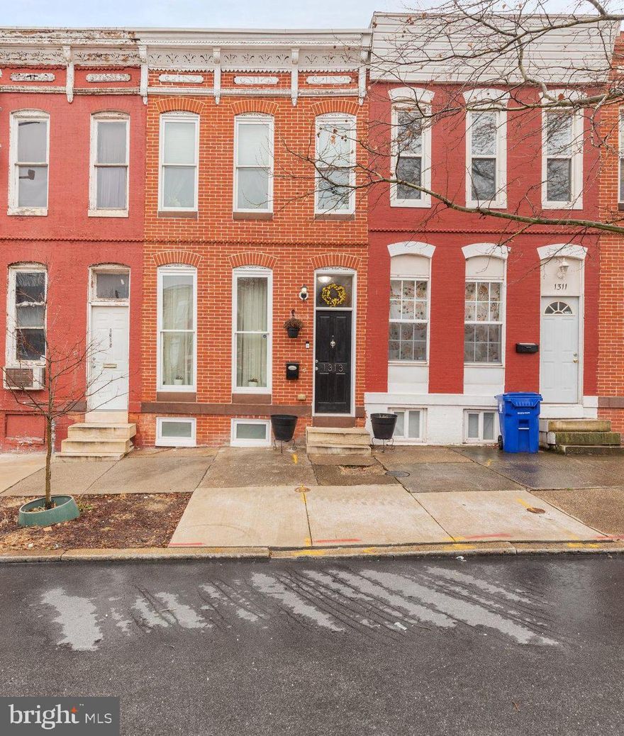 Do not miss this stunning recently rehabbed home. This home's main level has an open floor plan, gleaming hardwood floors, exposed brick, gourmet kitchen with granite countertops, stainless steel appliances, large island, custom tile backsplash, dining area and half bath. Upper level offers a beautiful primary bedroom with a large walk in closet and full bath, a second large bedroom and full bath. Lower level has a great family room, additional room that could be used as a third bedroom (but does not have a window) or office, laundry area with plenty of storage and a lovely full bath. Do not forget to check out the roof top deck with expansive city views and the fenced backyard!! Buyer to verify Chap Tax Credit (appr 2yrs remaining). 24-hour notice please.