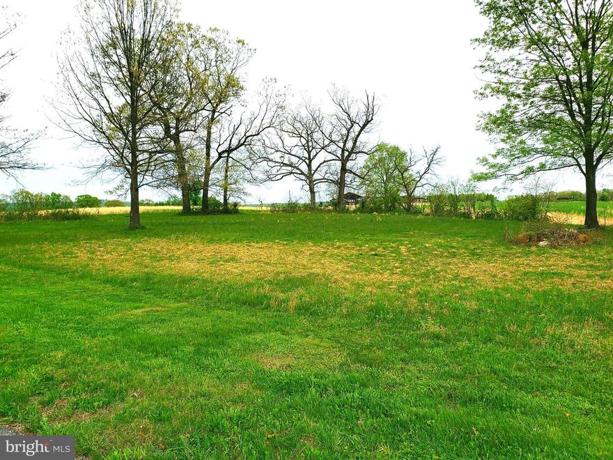 Own this very desirable lot with Lakewood. This lot is 1.14 cleared acres ready to build on. Great mountain and meadow views from all areas of the property. Lot conveys with paving and tap fees already paid. Don't miss this rare opportunity!!