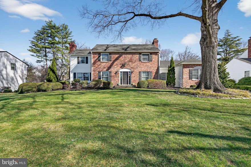Welcome to 50 Sutphin Road, a beautifully maintained brick-front colonial set on a generous .36-acre lot in sought-after Lower Makefield Township. Offering over 3,300 square feet of living space, this 4-bedroom, 2.5-bath home blends timeless architectural detail with inviting, light-filled spaces designed for both everyday living and memorable entertaining. From the moment you step into the foyer, you’re greeted by rich hardwood flooring accented by crown and chair molding, setting the tone for the craftsmanship found throughout. The formal living and dining rooms offer elegant yet comfortable gathering spaces, with refined millwork, warm wood floors, and thoughtful lighting that creates an ideal backdrop for both intimate dinners and larger celebrations. A wood-burning fireplace with a newer liner anchors the living room, adding warmth and character. The heart of the home is the well-appointed kitchen, featuring granite countertops, a center island, wood cabinetry, tile backsplash, and a stainless steel hood over the cooktop with double wall ovens, perfectly suited for cooking and hosting. Just beyond, the breakfast nook is bathed in natural light from skylights and surrounding windows, creating an uplifting space to start the day. This home truly shines in its expanded living areas. A stunning study/bedroom with skylights offers flexibility and inspiration, while the adjoining gathering room and sunroom continue the theme of natural light and serene backyard views. The sunroom, with windows on three sides and overhead skylights, is a peaceful retreat—an ideal spot to enjoy your morning coffee or unwind at the end of the day. The family room provides yet another inviting space, complete with a second brick-front wood-burning fireplace, custom built-ins, and detailed molding, making it perfect for cozy evenings or casual get-togethers. A convenient powder room completes the main level. Upstairs, the primary suite offers a comfortable and private escape with a spacious walk-in closet and an updated en-suite bath featuring designer tile and a glass-enclosed shower. Two additional bedrooms are all generously sized, each with excellent closet space and classic molding details, and share a well-appointed hall bath. The outdoor setting enhances the home’s lifestyle appeal. The rear deck and paver patio create an ideal environment for outdoor dining, weekend barbecues, and entertaining guests, with plenty of space to personalize and enjoy the surrounding yard. Whether hosting gatherings or simply relaxing outdoors, this backyard offers endless possibilities. Additional highlights include a full basement with laundry area and utility sink, as well as an oversized garage with vaulted ceilings, newer garage door, and the rare convenience of heating and cooling—perfect for hobbyists, storage, or a workshop space. Ideally located within the Pennsbury School District and just minutes from Yardley Borough, Yardley Country Club, and a variety of local shops and restaurants, this home offers both a peaceful residential setting and easy access to everyday conveniences and commuter routes. 50 Sutphin Road offers a rare combination of space, character, and flexibility in a location that’s hard to beat—ready to welcome you home.