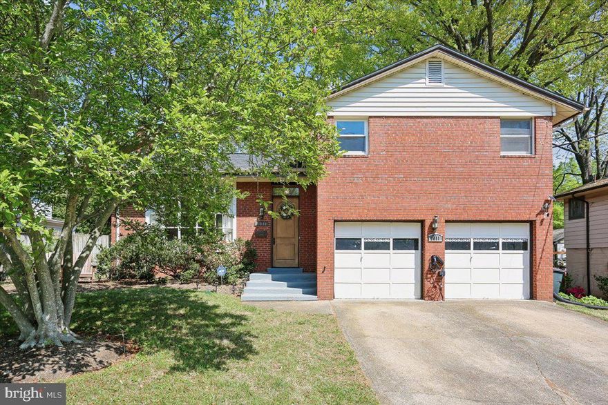 Expanded GREENTREE MANOR split with many updates!  5 bedrooms, 3 full baths. Conveying "AS IS" and awaiting buyers' additional touches.  LL1  features large family room with fireplace and sliding glass doors to back yard  plus office/bedroom with effective  en suite bath/hall bath; door to 2-car garage; LL2 features large rec/play room, den/office, and laundry/utility room.  Main level includes bright sun room addition plus a deck room. Upper level features two updated bathrooms and four bedrooms (two of which are connected by an interior door). Rear lot line is in front of the row of evergreen trees; side fence is inside the side lot line.
Roof and four skylights replaced in fall, 2022.   Air conditioner, furnace, and water heater (gas, 75 gal.) , installed in July, 2012.  Kitchen updated in 2012; Washer/dryer, 2012.
Fabulous opportunity to own in sought after community and location!  Open: 4/25  1:00 to 3:00.