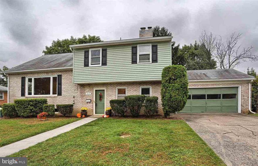 Superb 4 bedroom home with 2.5 baths and 2 car garage located in Latshmere Manor section of  Susquehanna Township.  Great new eat -in kitchen complete with range, dishwasher, disposal & refrigerator. Family rm with fireplace, wall to wall carpet and patio doors  1st floor powder room. Living & Dining rms with hardwood floors. Hdw flrs in all bdrs. Master bedroom with bath. Laundry rm complete with washer, dryer & laundry tub.  Newer replacement windows.  Natural Gas Available, close to schools & interstates