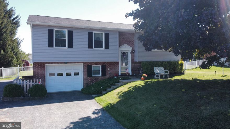 What a great location!  Close to shops, restaurants and I-83.  This home has so many updated features, including a new Furnace; Double hung windows; Granite countertops; 200 amp electric; newer Stove, Dishwasher, Microwave and Washer; newer Roof, Water Heater and Central Air; new Plank Laminate Flooring and double hung Windows in the last 8 years.   The huge fenced in yard and double deck out back can be your tranquil at the end of the day. Don't miss your opportunity.  It will not last.