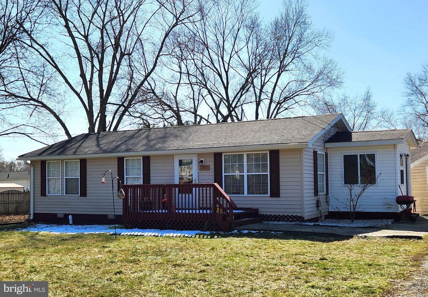 NEW ROOF, SOFFIT AND FACIA JUST COMPLETED (30-year architectural shingles)!  Work from home in this beautiful rancher!   Offering 3BR/1BA, living room, dining area, kitchen and office.  Offering living room, kitchen with recently painted cabinets, tiled backsplash, pantry, new appliances and laundry area in closet.  Office has vaulted ceiling and exterior door to the side yard. Three carpeted bedrooms and a full bath.  All of this is located on a nice level .25+- acre lot. Fenced back yard. HVAC was installed in 2022 and hardwood flooring throughout most of the property. EBB heat in office.  Minutes to schools, shopping, restaurants and convenient for commuters! **Security cameras are on and recording. Will not convey with the property.**