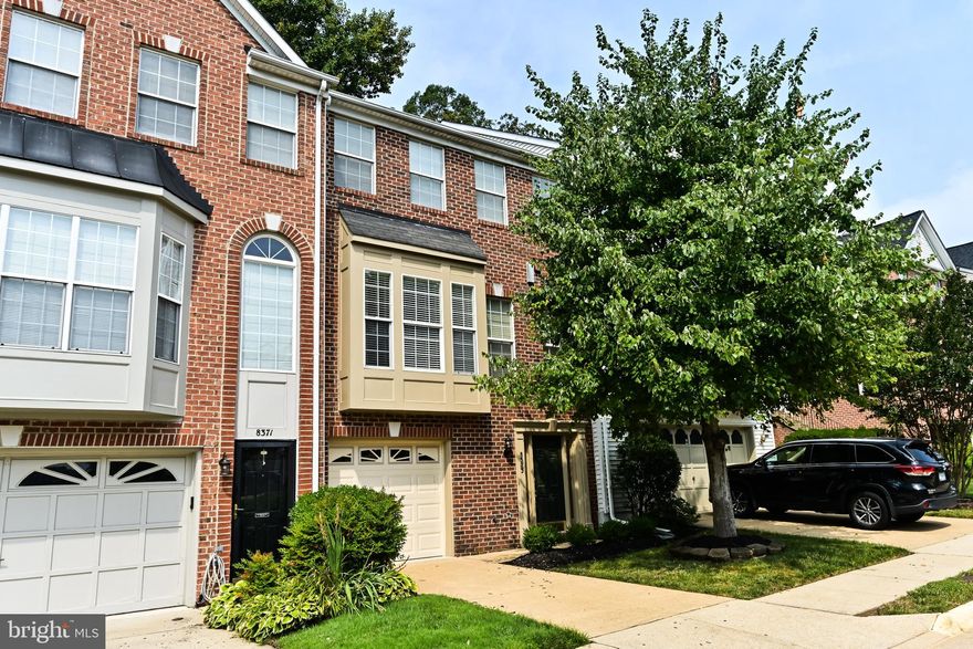 ***Stately Brick Front Garage Townhome in West Springfield right across the street from the Whole Foods shopping center***Spacious entry foyer with new light fixture welcomes you with brand new luxury vinyl plank flooring. Freshly painted on all 3 levels, brand new LVP on main level, popular open concept floor plan and available to move in right now. Featuring 3 BRs & 2.55 BAs on 3 spacious levels. Starting on the bedroom level with Generous primary bedroom suite has a light & airy feeling with vaulted ceilings & an enormous walk-in closet, private bath with dual sink vanity, contemporary LED lighting, soaking tub & sep shower. 2 Spacious additional bedrooms with ample closet space, six panel doors, plush carpeting & nice window blinds/treatments in all bedrooms. Additional bedrooms share an upgraded hall bathroom with tub/shower combo, contemporary LED lighting & comfort height vanity. Incredible main level offers: Open Kitchen with breakfast room & breakfast bar countertop, lots of cabinets space & a pantry closet, opens to relaxing family room with cozy gas FP & mantle, dining area with new elegant chandelier opens to freshly stained DECK backing to trees. Don't miss the upgraded half bath with new LED contemporary lighting in hallway. BONUS!!! Main level laundry with full size washer & dryer. Walk-out lower level has a huge recreation room, upgraded half bath, storage closet & exit to garage parking. This level has brand new LVP (luxury vinyl plank wood-look) & exit to back through sliding glass doors.