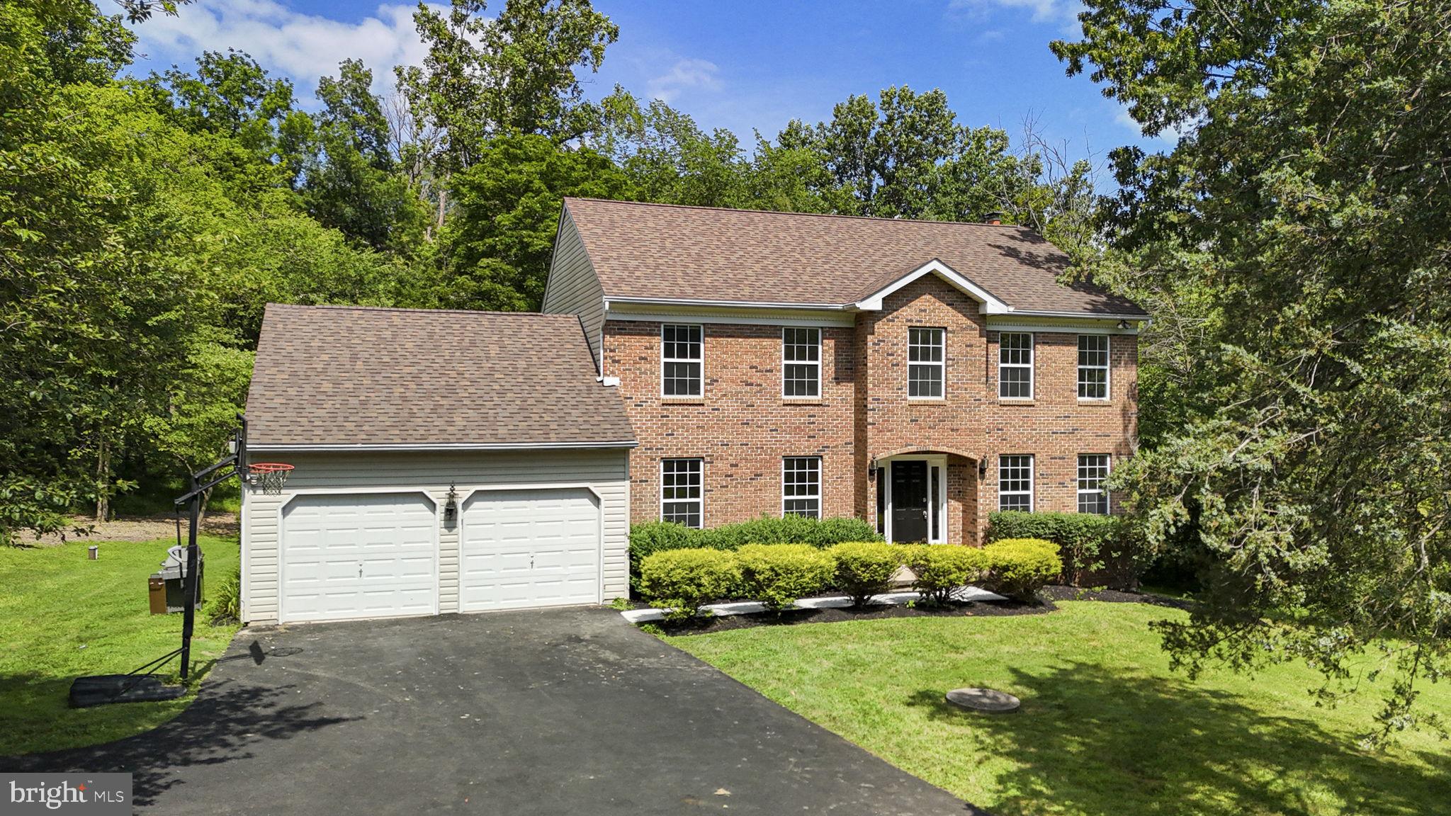 Welcome to this spacious and well-maintained 4-bedroom, 2.5-bath home tucked away on a quiet cul-de-sac in Pottstown. Set on a 2 acre wooded lot, the backyard offers privacy and a peaceful natural backdrop—perfect for enjoying the brand-new, low-maintenance deck. Whether you're entertaining, savoring your morning coffee, or unwinding with a good book, this space is a perfect outdoor retreat.
Step inside through a bright foyer that welcomes you into a warm and functional layout. To the right, you'll find a cozy living room, while to the left sits a large, light-filled formal dining room. The open-concept kitchen is ideal for gathering, offering ample counter and cabinet space, along with a sunny breakfast area that flows into the spacious family room. A wood-burning fireplace creates the perfect ambiance for cozy winter nights or relaxing evenings at home.
Just off the kitchen, a practical mudroom features laundry, access to the 2-car garage, and a door to the backyard. A powder room and convenient hall closets complete the main level.
Upstairs, the generously sized primary suite includes a huge walk-in closet and private ensuite bathroom. Three additional well-proportioned bedrooms, a hall bath, and a large linen closet provide plenty of space for everyone.
The finished basement offers additional living space, plus a dedicated workshop area and plenty of unfinished space for extra storage. Recent updates include fresh interior paint and a brand-new water heater.
Set in a serene, wooded setting with a thoughtful floorplan and inviting spaces throughout, this home is ready to welcome its next chapter. Close and convenient to everything—including Route 422, the outlets, restaurants, and shopping—but just far enough away to feel like a peaceful retreat from the everyday rush.