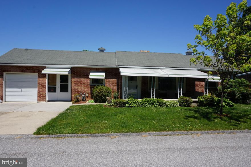 Impressive Brick Rancher in Suburban School District.  Featuring 3 Bedrooms with Hardwood Floors, Deep Closets and a Master Bedroom and Full Bath. Spacious Living Room with Wood Fireplace, Family Room/Bonus Room Overlooks the Fenced Back  Yard. Eat In Kitchen with New Counter Top and Appliances.  Full Basement could easily be finished for more living space.  Enclosed Breezeway also gives more square footage and leads to 1 Car Garage.  Deck in the Back Yard with Awning and Covered Front Porch.  New Windows and Newer Furnace and A/C.  Great Home and Location.  Check It OUT!