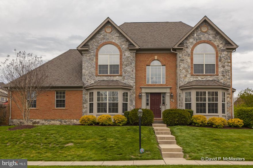 Exceptional Award Winning Home, Charles Town, WV Looks like right out of  "Architectural Digest".  This exceptionally well appointed award winning former model home in the classy Beallair gated community, (a former George Washington family plantation), 1 mile from Route 340 between Charles Town and Harpers Ferry. 5 bedrooms 4.5 baths. Stone and Brick.  Beautifully decorated. FURNISHINGS NEGOTIABLE.  View of meadow and mountains. Sited across from Park. Great gourmet  kitchen, hardwood floors, stainless steel appliances, granite counters. Gas fireplace in large family room.  FIRST FLOOR MASTER SUITE, bath with jacuzzi tub, walk in closet.  Custom blinds throughout. Windows tinted through out. Main floor and second floor hardwood floors through out. Second floor bedroom used as  dressing room with amazing built-ins. One Bedroom used as office with built-ins.  ( all built-ins can be removed if not needed).   Huge finished basement with full bath and bedroom.  Garage. Private terrace off the family room,  New HVAC in 2018.  Immaculate.    Low Maintenance living. Care free.  NO MOWING or SNOW SHOVELING!!  Move in ready.  10 Minutes to MARC COMMUTER TRAIN to DC.  The community center across the street is a former Washington Manor Home. ( Lots of activities and groups available if interested). Walking trails in the park and along the creek.   The Eastern Panhandle of WV is often cited as the "best place to retire in the D.C. region." This property is within 10 miles of Harpers Ferry, Charles Town, the Potomac and Shenandoah Rivers, The Appalachian Trail, C+O Canal, Hollywood Casino and Racetrack, + Shepherdstown WV, a university town with great restaurants,  renowned National Contemporary Theatre.  And, by the way, we think  it's prettier out here than DC.PS:  GREAT VALUE