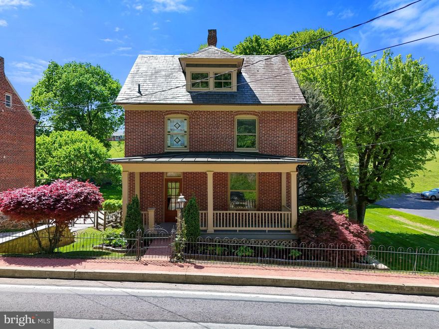 Welcome to this beautifully maintained brick home that seamlessly blends character, comfort, and thoughtful upgrades — inside and out. From the moment you arrive, you’ll appreciate the curb appeal, featuring a brand-new metal porch roof, extensive landscaping, and a custom retaining wall that frames the house beautifully. The exterior also boasts a stamped concrete patio area perfect for outdoor entertaining, whether you're grilling, relaxing around a fire pit, or enjoying quiet evenings. There’s also a detached garage and ample off-street parking, a valuable feature.
Step inside through the spacious mudroom, where you’ll find tile floors and custom reclaimed cabinetry that adds a rustic, one-of-a-kind charm. The main living area features an open-concept layout with exposed beams, pocket doors, and rich cherry hardwood floors that add warmth and continuity throughout. The kitchen is well-appointed with upgraded appliances and blends style with function.
The main bathroom is oversized and feels like a private retreat, featuring a large tiled walk-in shower, a jetted jacuzzi tub, and stunning stained-glass windows that lets in soft natural light while preserving privacy. Each bedroom offers plenty of space, with one room offering access to a spiral staircase that leads to a finished attic — perfect for a fourth bedroom, home office, or cozy den.
Downstairs, the fully finished basement is a standout feature, offering a second large bathroom with a walk-in tiled shower, tile flooring throughout, and beadboard ceilings that give the space a clean, finished look. Whether you need additional living space, a guest suite, or a comfortable spot for movie nights, the basement is ready for whatever you envision.
This home has been lovingly cared for and thoughtfully upgraded. It offers a unique combination of timeless craftsmanship and modern convenience — perfect for anyone looking for space, charm, and long-term value.