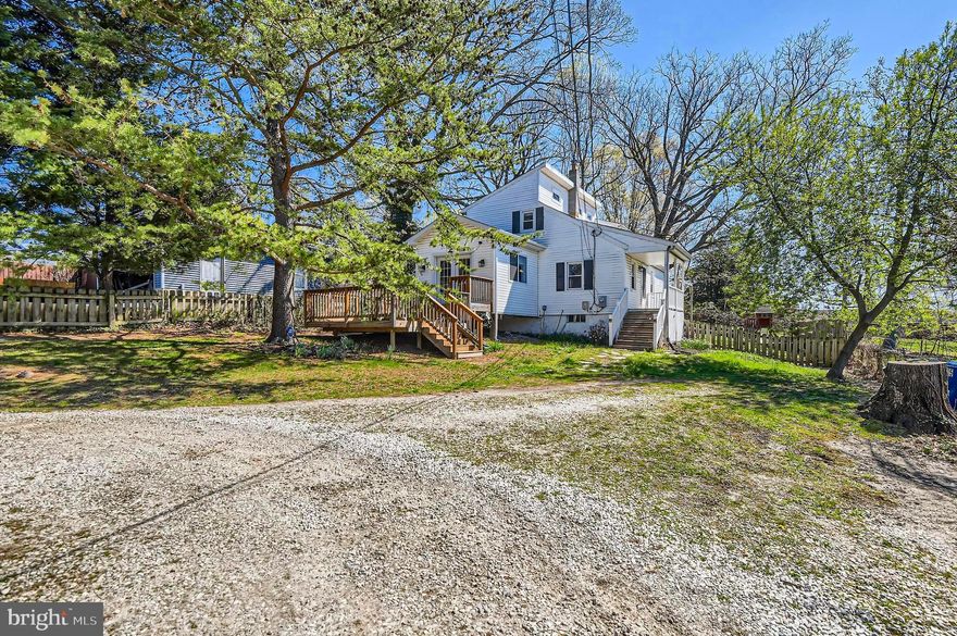 Coming Soon!  Profession Photos Coming.
Welcome to 9505 Ridgely Ave. Enter through the gated driveway, and you will feel like you are in your private retreat. Enjoy front and rear decks with a pergola, covered porch, hot tub (as is), tot lot, and circular driveway.  If you love fresh fruit and veggies, there is plenty of space to plant your garden. This yard allows for outdoor fun and entertainment, all situated on .35 acres. Enter the home and notice the lovely eat-in kitchen, a comfortable family room with a deck off the front, and a beautifully renovated full bathroom. On the 2nd level, you will find 3 bedrooms. The primary bedroom has a private balcony, which is perfect for an evening glass of wine or morning coffee, and a bonus area. The basement level has laundry, great storage, and a second bath that is not used (as is), which has excellent potential to increase your living space. A fantastic opportunity to add your style and make it truly shine!
This property has been updated as a leasehold. There has been no ground rent for over a decade, and no owner is listed for ground rent. SDAT does not have this property listed as a leasehold. Sold as is.