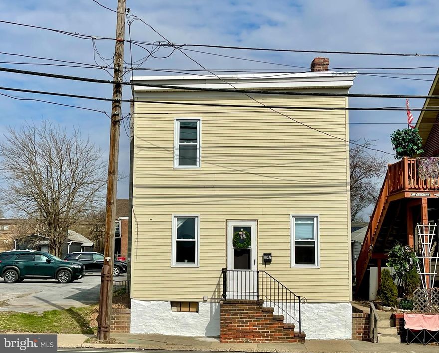This 3 Bedroom, 1.5 Bath completely renovated, move-in ready Single Home is located in Stowe, West Pottsgrove Township, POTTSGROVE School District.  Enter the bright cheery & brand NEW kitchen which includes new stainless steel appliances (refrigerator, smooth-top electric stove, over-the-range microwave & dishwasher), new shaker-style cabinetry, new countertops and new plumbing fixtures!  There is a smaller bonus room off kitchen which could be used as a bedroom or bonus room.  The living room is huge and can allow for a dining area as well.  The 1st floor half bath is all NEW and has a full linen closet.  The 2nd floor houses 2 additional bedrooms with closet space galore & a brand new full bathroom!  NEW WINDOWS throughout!  NEW flooring carpet & vinyl throughout!  NEW paint throughout! NEW exterior & interior doors throughout!  NEW lighting fixtures throughout!  NEW rear concrete porch!  Off-street alley access parking is convenient.  This property is zoned CB--Commercial Business District (Contact West Pottsgrove Township directly for allowed uses and zoning description).  Also, this property has VERY LOW PROPERTY TAXES--Under $2K!!!  There is an ADJACENT .26-ACRE VACANT LOT WHICH IS AVAILABLE FOR SALE FOR AN ADDITIONAL AMOUNT BUT ONLY IF BOUGHT ALONG WITH SUBJECT PROPERTY (1017 W. HIGH STREET).  This adjacent lot would allow Buyer to expand the yard and/or have additional parking.