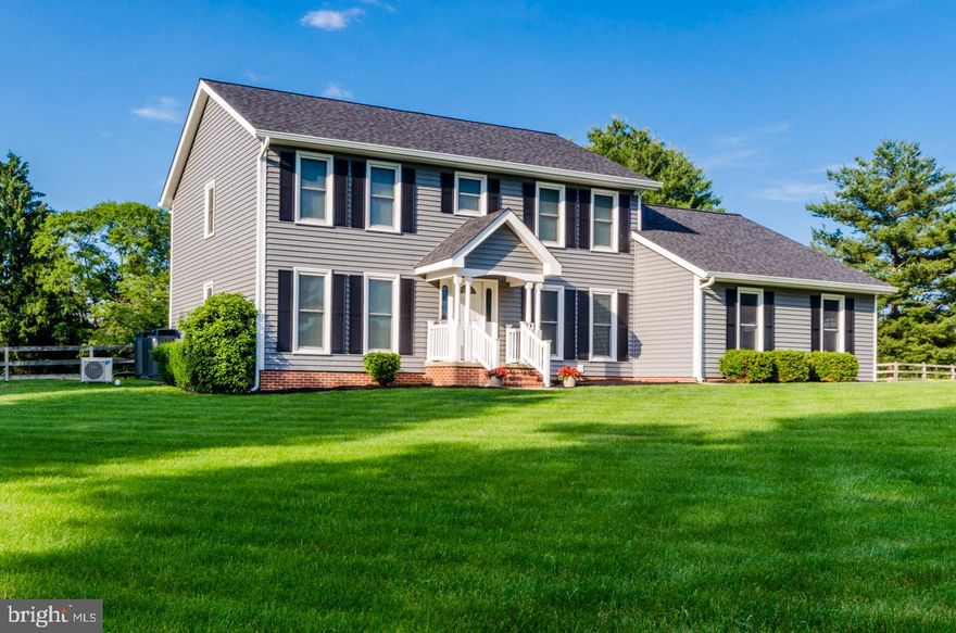 This house is perfect!! The owners have put so much time, love and effort into making sure the property and home are in tip top shape for you, the new owners. You won't have a care in the world! New roof, new siding, new septic system, new heat pumps, new carpet, new wood flooring, new light fixtures, new paint. It is move in PERFECT!  The lot is 2 acres of flat, beautiful lawn with a few giant shade trees as well. The fully fenced backyard is just waiting for entertaining and your personal touch. The house has ample storage in the floored attic, and a second 24x24 detached garage. Gorgeous kitchen cabinets and granite countertops. There is a beautiful morning room off of the family room area for oodles of light and space.  Upstairs master bath has a brand new, large shower! Everything the owners have done has been done so you will not have a care in the world or any worries on how it was maintained.  When you purchase this property, it comes with a 50 year roof warranty, a home warranty and a siding warranty as well.  Do not miss this!!