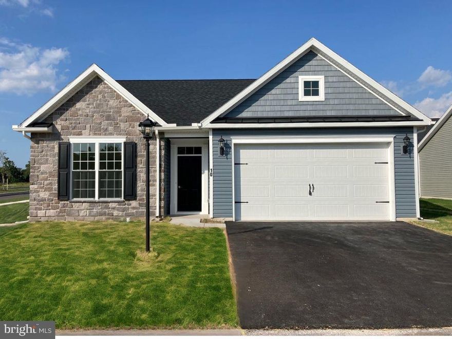 Our Carol floorplan on slab in now available in Cumberland Village at Marsh Creek! This Floorplan includes 9ft Ceilings on 1st Floor –  Upgraded Siding Style & Color – Stone Front at Bedrooms #2 with Gable - Medal Pent Roof at Garage and Bedroom #2 – Covered Patio – Transom Window Above Front Entry Door – Painted Kitchen Cabinetry with Crown Molding – Stainless Steel Appliances – Granite Kitchen Countertops – 3x6 Kitchen island – Two Pendant Light Rough-ins at Kitchen Island – Laminate Plank Flooring in Foyer, Hall to Bedrooms, Great Room, Dining Room, Kitchen & Laundry Room – Upgraded Ceramic Tile in Primary Bathroom & Hall Bathroom – Upgraded Carpeting & Padding in All Bedrooms – Two Walk-in Closets in Primary Bedroom – Gas Heat! Please check with our sales manager for details, incentives and  to receive access to Carol model. Please contact us today for more details! Open Daily 11am to 6pm! Please Note - The completed photos shown are of another like Carol Model. Photos may show additional options.