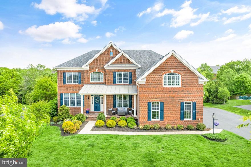 This is a meticulously updated and desired 3 Car Garage Duke Model Home by Toll Brothers, nestled into the end of a Quiet cul-de-sac located in an Award Winning Gated Golf Community with Resort Style Amenities, that has it all! 

When you enter the front door you are welcomed by a covered front porch and beautiful new hardwood flooring throughout the Main and Upper Levels. A completely renovated Sitting & Dining Room with upgraded moldings, a private study room on the main level, and an Extended Family Room with a Gas Fireplace open to the amazing Chef-Inspired Kitchen with a huge island with pendant lights, a large walk-in Pantry, Custom Tile Backsplash, and a Rear Staircase to the Upper Bedroom Level. A bright & light Master Bedroom with Sitting Room, Tray Ceiling, and 2 Walk-In Closets. Each additional Bedroom features an en-suite bathroom & walk-in closet.

Enjoy and Entertain in the fully finished walk-up basement with a large Theater Room, Bar, Fitness Area and Recreation Room with a 5th Bedroom & Full Bath. The outside boasts Trex Deck with Custom Gate & Stair Lighting and a Stamped Concrete Patio with Flagstone Retaining Wall along with a 6 Zone Irrigation System along the property.

Dominion Valley Country Club features a magnificent 18-hole Arnold Palmer Signature Golf Course, luxurious Clubhouse and Waverley Club, state-of-the-art Sports Pavilion, swimming pools, tennis courts, ball fields, sand volleyball, new neighborhood schools, onsite Market Square, and much more. 

You have to see this home to fully appreciate it!