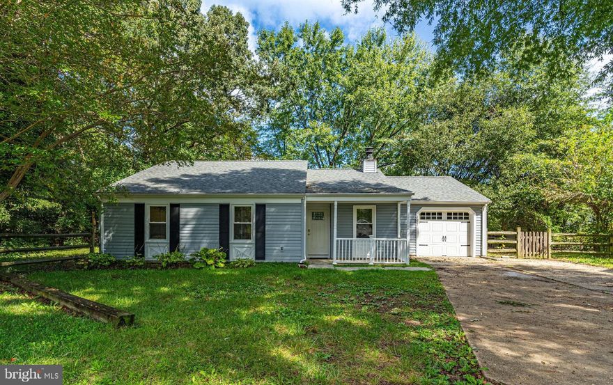 This charming rambler is nestled in a peaceful cul-de-sac, offering a delightful living experience. Boasting three cozy bedrooms and one and a half baths, this home also features the convenience of a one-car garage. The interior has been recently adorned with fresh paint and new carpeting. The remodeled kitchen has been updated with granite countertops and stainless steel appliances. The bathrooms has also been recently remodeled. The living room greets you with a soaring cathedral ceiling, Pergo floors, and a wood-burning fireplace, promising warmth and comfort during those chilly evenings. The adjacent dining room is adorned with a ceiling fan and elegant chair rail detailing, a theme that gracefully extends into the living room.
The laundry room is a true gem, boasting a vaulted ceiling, full-size washer and dryer, and ample extra cabinets for storage. The electric hot water heater ensures you have plenty of hot water when you need it. A door from the laundry room leads to the one-car garage, complete with an auto garage door opener and a built-in workbench. An exit door from the garage provides convenient access to the side of the house.
Step into the backyard, which is not only fenced for privacy but also boasts a lovely concrete patio, perfect for outdoor gatherings and relaxation. Notably, this home features an updated roof with architectural shingles and updated vinyl siding, ensuring both style and durability. With its blend of modern amenities and thoughtful updates, this property offers a comfortable and inviting place to call home.