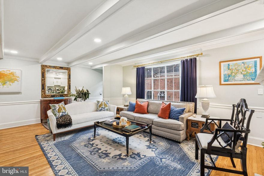 Tucked along one of WashWest’s most intimate and picturesque walkways, 1206 Waverly offers a rare blend of privacy, charm, and space in the heart of Center City. This beautifully maintained 3-bedroom, 2.5-bath townhome lives wide and bright, featuring a thoughtful layout, timeless character, and the added convenience of a deeded parking space just a few blocks away.

A full-floor, light-filled living room welcomes you with refinished hardwood floors, a cozy fireplace, recessed lighting, classic chair rail detailing, exposed beamed ceilings, and handsome built-ins. A glass door opens to a serene brick patio, shaded by a mature evergreen tree—perfect for morning coffee, container gardening, grilling, or relaxed outdoor dining.

One level down, a sunlit solarium brings in wonderful natural light, enhancing the adjoining dining area and kitchen. The open kitchen is equipped with stainless steel appliances and a built-in gas range, while the lower level flows comfortably for everyday living and entertaining, complete with a powder room and a convenient mechanical and storage closet.

The second floor is dedicated to the primary suite, offering a built-in bookshelf and excellent closet space. A double vanity serves the primary bath, which is located in the hall on this level. Upstairs, two generously sized bedrooms share a bright hall bath—well-suited for guests, family, or a home office.

Ideally located, this home is just steps from Seger Park, Antique Row, Whole Foods, and neighborhood favorites—including acclaimed dining spots like Kiddo—with Washington Square, the 13th Street corridor, Old City, and Independence Hall all within easy walking distance.

1206 Waverly pairs storybook charm with modern livability—offering bright interiors, inviting outdoor space, and rare deeded parking in one of Center City’s most sought-after central neighborhoods.