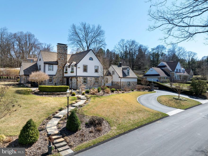 Immerse yourself in timeless elegance as you enter this remarkable residence through its distinctive circular entrance. Enhanced by a copper mailbox and a courtyard with a tranquil fountain, this home exudes charm and sophistication. Built in 1935 by the acclaimed Palmer and Lambdin, it stands as one of the first few homes built in the prestigious and desirable Wyndham Hills Neighborhood. This property seamlessly blends historic character with modern luxury, featuring a year-round heated plunge pool and a fully equipped outdoor kitchen, perfect for entertaining or relaxation. Inside, the interiors have been meticulously crafted, showcasing custom cabinetry and exquisite finishes that perfectly balance style and functionality. This home is a rare opportunity to embrace both historic beauty and contemporary living. Boasting four bedrooms and three full baths, the home offers a unique layout. The fourth bedroom, currently used as a private office, is detached from the main living quarters, situated on its own side of the house. The first floor features a luxurious kitchen, complete with an island, Sub-Zero refrigerator, Viking double ovens, a warming drawer, range oven, hood vent, and quartz countertops. The spacious island provides seating, while under-cabinet lighting and a small wet bar add convenience and elegance. With two dishwashers, cleanup is always a breeze. The formal dining room is adorned with a stunning chandelier, crown molding, sconce lighting, and gleaming hardwood floors. Curved staircases lead to the upper level, where the Primary Suite awaits with a lavish ensuite bathroom. Additional features include a sunroom with hot water baseboard heat, a screened-in porch for year-round outdoor enjoyment, and a two-car garage. This home comes fully equipped with a smart home including locks, lights, and security system, and whole house generator. Every detail of this residence has been meticulously curated, from the custom cabinetry to the exquisite finishes, creating a rare opportunity to experience historic beauty seamlessly integrated with contemporary living. Call today and schedule your private tour!