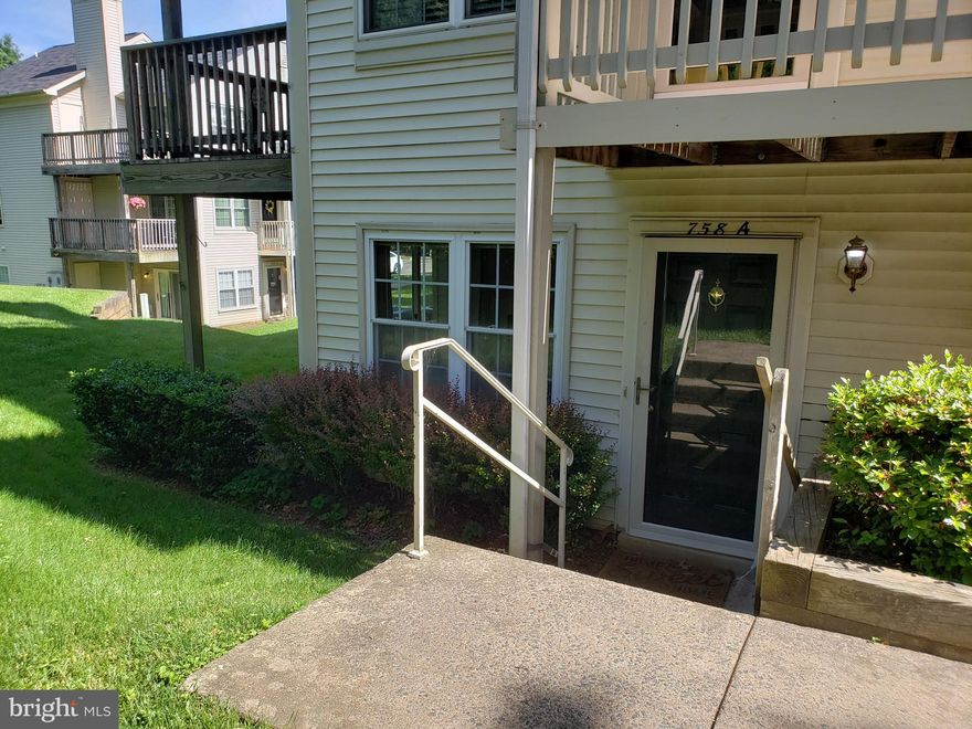 Perfect location—walking distance to Planet Fitness, Safeway grocery store, and more! This 2BD/2BA condo in the sought-after Cedars of Warrenton offers convenience and comfort. A main-level ground unit, it features a spacious "backyard" area maintained by the condo association and an exterior storage closet off the patio. Inside, enjoy a bright and open floor plan with luxury vinyl flooring and a cozy natural wood-burning fireplace. The kitchen boasts stainless steel appliances and a gas stove, while the laundry room includes a stacked washer/dryer, allowing extra pantry space. Both large bedrooms have walk-in closets and full baths, with the primary suite featuring a walk-in shower and double sink vanity. Don’t miss this fantastic opportunity!