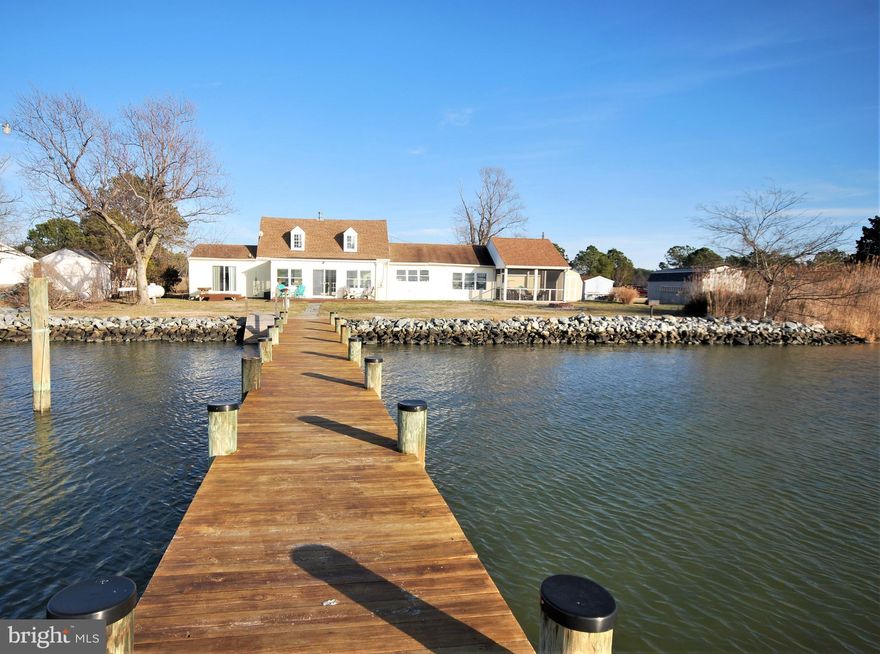 Own a piece of Eastern Shore Waterfront History 
Perfect Sunset views across Slaughter Creek looking at Taylors Island. This move in ready shore home is here for your Family. Historic 1900’s Waterfront Home maintains just enough of its original charm. Including the Original Main House Pine Floorboards, Front paneled door and the original wood Staircase leading to the traditional Cape-Cod Style second floor bedroom area with second floor ½ bath. 2nd. Floor rooms have great Water View dormer windows. 

Waterfront Living at its best with scenic views of Slaughter Creek from nearly every room of the home. Private Peir dock, for Boating, Fishing, Crabbing and relaxing watching the tides change and Sunsets. Family size full year screened porch with farm table to gather and enjoy all this property has to offer. With traditional floor plan additions encompassing the original 1900's historic home. You now have charm and character with lots of modern amenities. Waterfront first. floor Primary King size ensuite with all New fully remodeled Bathroom with tile floor and low step in full Marble Tile Shower, and private exit to small sitting deck and direct access to the water. Additional first. floor bedroom # 2, another large bedroom currently with a Queen bed but large enough for a King, plenty of closet storage throughout the home. Original Wood floor large living room with French doors leading to the Full Waterfront Sunroom for year-round water views and a large deck facing the water. Off the living room is another Fully Remodeled full Bathroom with custom tile step in shower. Additional first floor features Large Kitchen with Like New Appliances Large and Small, A Full Array of Cabinets with built in pantry cabinet and Movable Island Cabinet, the joining Utility room holds the Gas Heat system new electric water heater and new full size stacked Washer and Dryer Off to the side of the Kitchen you’ll enjoy a large dining area All of this area has beautiful waterfront views, and easy walk through access to the Screened in porch. 

Property features: private dock, walk in water access with canoe boat launch 2 Waterside decks, built in Fire Pit, Park style built in grill and gas grill, brand new 8x10 storage shed and one car size garage/shop with electric lights and concrete floor. The home could be sold fully furnished except for the exclusions of some small personal items. Amazing Fishing and Crabbing right off the dock and Hunting all through the area. Boating is extremely easy access to the Chesapeake Bay. Nearby Slaughter Creek Marina offers: slip rentals, fuel dock, and ship store and restaurant. This piece of Eastern Shore History offers a Home that is hard to beat.