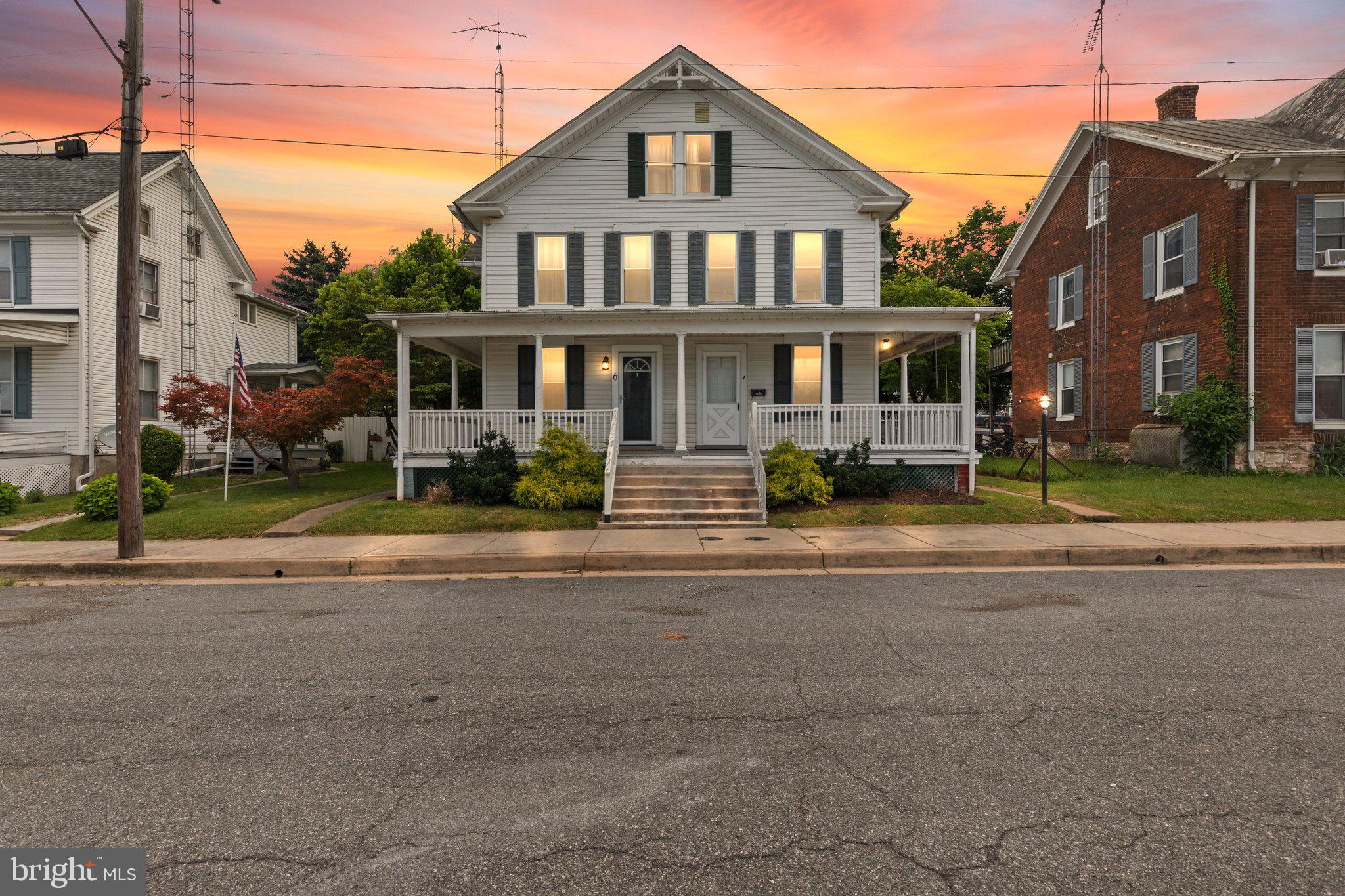 Welcome to Your Charming New Home at 4 N Farquhar!! This home offers tons of historic charm from the front porch (with bolts for porch swing) to original banisters to hardwood floors and amazing 3rd level!! This home even offers some vintage charm with the full bathroom on the 2nd level! 3 Generously size bedrooms and a full 3rd level for even more potential living space! Out back, you will enjoy plenty of space to run & some space for grillin'! The detached garage offers a concrete floor to house a vehicle, other rec vehicles or just extra storage!
