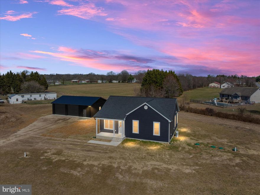 Welcome to modern country living with room to breathe. This nearly new rancher, only 6 months old, sits on 2.34 private acres with NO HOA, giving you the freedom to truly enjoy your property.
Inside, the home features LVP flooring throughout, creating a seamless and durable living space. The stunning kitchen is the heart of the home with sleek cabinetry, gorgeous quartz countertops, and a clean modern design, perfect for everyday living and entertaining.
The spacious primary suite offers a true retreat, featuring a double vanity, stand-up shower, and a large walk-in closet. Thoughtful design and quality finishes continue throughout the home, offering the feel of brand-new construction without the wait.
Step outside and you’ll find where this property really shines. A large detached garage provides incredible space for vehicles, hobbies, storage, equipment, or a workshop. With 2.34 acres and no HOA, you have the flexibility for animals, outdoor toys, gardens, or simply enjoying the privacy and open space.
If you’ve been looking for new construction with land, modern finishes, and the freedom of no HOA, this property checks all the boxes.
Come experience space, style, and freedom — all just minutes from town.