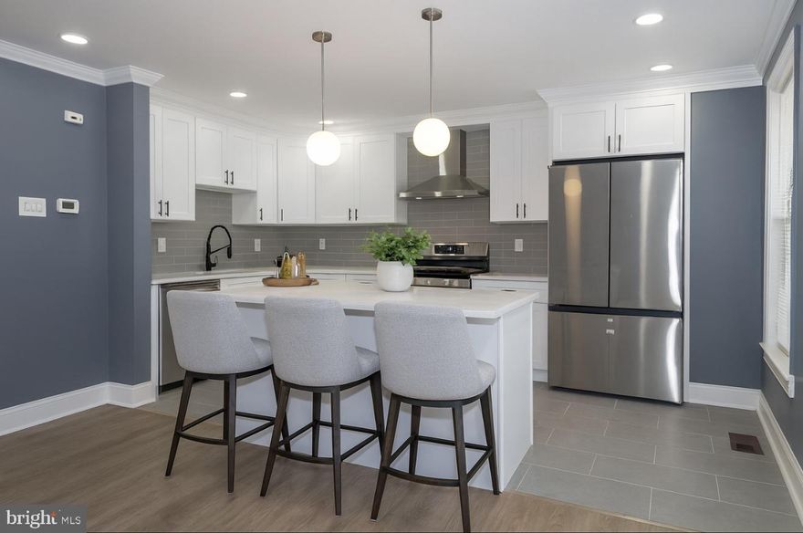 7429 Tanager Place, Philadelphia, PA 19153. Welcome to this beautifully renovated 2-story brick rowhome located in one of Philadelphia’s most desirable neighborhoods! This spacious home offers 3 bedrooms, 2 full bathrooms, and a half bath, perfectly blending modern upgrades with comfortable living.
The highlight is the master suite, complete with a private full bathroom and a walk-in closet. The two additional bedrooms are generously sized and feature plenty of closet space. Step inside to find a brand-new kitchen with high-end appliances, stunning new bathrooms, and luxury waterproof flooring throughout. The home also includes a fully finished, walk-out basement with a half bath, providing additional living or entertainment space. All major appliances—refrigerator, washer, dryer, and cooking range—are included, making this a true move-in ready home. Enjoy a beautiful front yard, a fenced backyard, a 2-car driveway, an attached garage with remote door opener, plus ample street parking. The location can’t be beat—just steps to public transportation, including the trolley to Center City (15 minutes), and minutes to PHL Airport, I-95, UPenn, Drexel University, University of the Sciences, CHOP, and HUP. Shopping and groceries are only a few blocks away. This stunning property is a must-see—don’t miss the chance to make it yours!