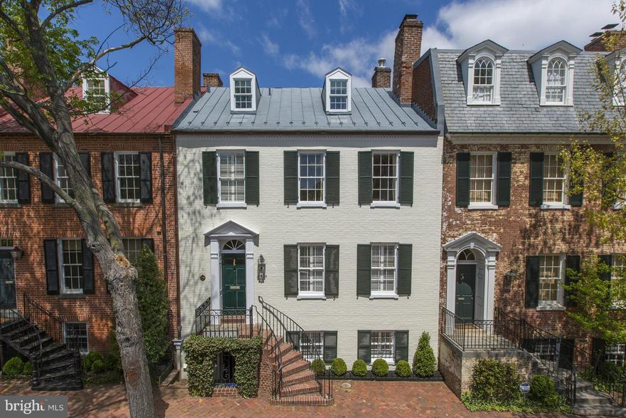Built in the early 1800 s, this charming 28  wide Federal has been restored, renovated, and sits high above the street affording privacy and security. Luxurious features and detailing, custom built-ins, custom millwork, high ceilings, and five fireplaces highlight the 4 sun filled levels of the residence. 4 BR/4.5 BA. Lovely rear tiered garden.