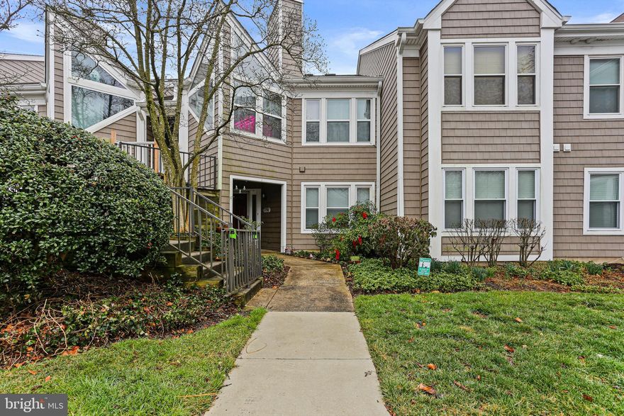 Don't miss this  lovely 2 bedroom 2 bath patio home in the lovely community of Woodland Village. Ready for move-in.  Patio unit with covered entry and extra secure storage closet adjacent to front door.

The condo  includes  fresh paint and carpet. The living room and dining areas include beige vinyl plank style  flooring, and a wood burning fireplace. The updated kitchen includes white cabinets and appliances.

The bedrooms have new carpet.  Each bedroom has its own bathroom.  The primary bath is off of the primary bedroom.  The  outer  vanity area  has new  LVP flooring. The bathing area includes a  large oversized soaking tub/shower.

 The HVAC System was replaced in 2022. There is also a newer washing machine (2 years old).

 There is a monthly condo fee and an annual recreation fee.  Enjoy the built-in community amenities during the summer season. The recreation fee includes access to the outdoor pool, tot lot, tennis courts and community facility.

Easy access to recreational activities, shopping, restaurants and entertainment. Easy commute to Baltimore, Washington, Columbia, Ellicott  City, train station and airport.

Check this patio level unit out today!