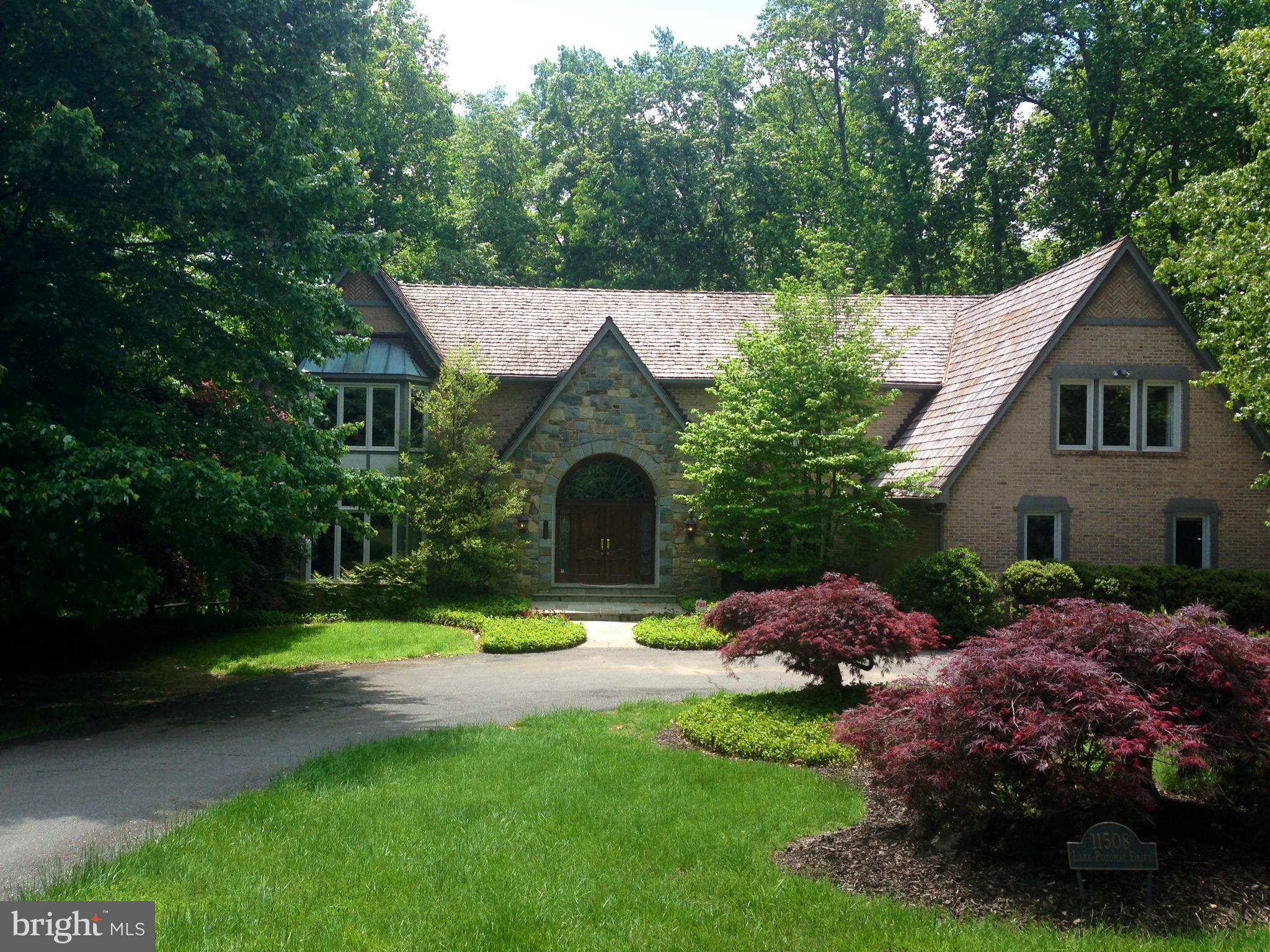 Unbelievable price for HUGE, well maintained, stately stone manse, 7,000+ SF, private 2+ acres. New stainless steel applianceDramatic 2 story marble entry foyer, generously proportioned rm sizes perfect for lg scale entertaining. Panel library, vaulted ceiling FR open to country kitchen w/bay sitting area. Big Mstr BR suite w/sitting rm, luxurious MBA. lwr lvl w/game, exercise rms, au pair suite.