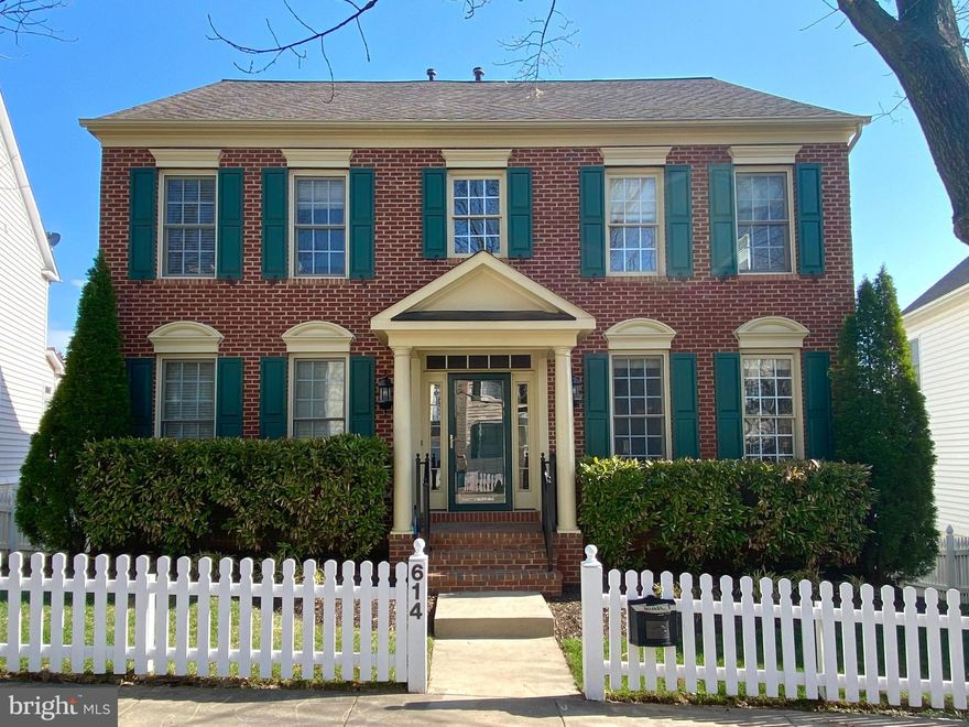 The Lakelands listing you’ve been waiting for! This beautiful brick-front home offers spacious living areas, fabulous flow, an ideal location, and a big, level backyard perfect for play, relaxation, and entertaining. Hardwood floors welcome you into the entry foyer, flanked by a private office with double French door entry and the gracious dining room with elegant moldings. The convenient butler’s pantry connects seamlessly to the spacious kitchen, featuring granite countertops, a large central island, updated appliances, and a generous pantry closet. The sunny breakfast area adjoins the kitchen as well as the mudroom/laundry room area, with a utility sink and extra cabinet storage – and offers access to the expansive deck. Just off the kitchen, the family room features recessed lighting and a stacked stone fireplace. An updated powder room and a coat closet complete the main level. Upstairs, the primary suite is a true retreat featuring a double-door entry, tray ceiling, crown molding, a lighted ceiling fan, and a large walk-in closet. The beautifully updated en-suite bath features custom tile, a glass-enclosed shower with dual shower heads and bench seating, custom cabinetry, built-ins, and a private WC. The three additional generously sized bedrooms include lighted ceiling fans and ample closet space, while second full bath is updated with custom tile, glass shower enclosure, double-sink vanity, and decorator lighting and fixtures. Highlights of the finished walk-out lower level include a large recreation room, a game room area, a bonus room with walk-in closet, and a third full bath beautifully updated with custom tile, glass enclosed shower, granite-topped vanity, and decorator lighting fixtures. This level also offers plenty of space for storage and direct access to the patio and back yard. Outside, enjoy the large deck overlooking an expansive fenced lawn and shaded patio bordered by blooming gardens. A paver walkway leads to the detached double-door garage with overhead rafter storage plus a parking pad with space for two additional cars. Ideally located on a picturesque street close to the countless shopping, dining, and entertainment options this sought-after neighborhood has to offer as well as to Lakelands Park Middle School and Lakelands state-of-the-art recreation facility, this home has it all!