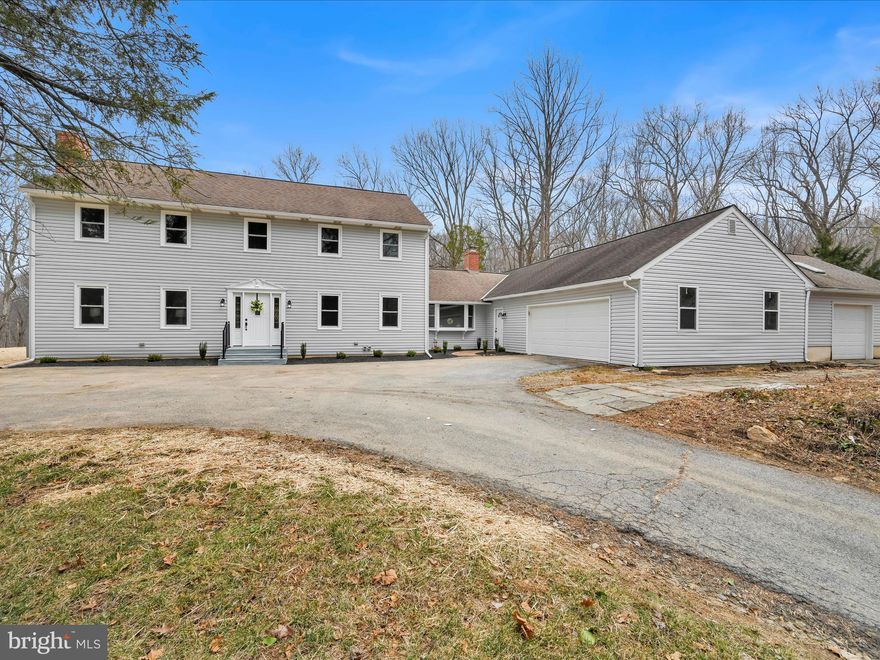 Here is your chance to purchase a fully renovated home situated on 5+ wooded acres  in the heart of Oxford! As you step in the front door, you are greeted with a traditional layout that offers a dining room, a living room with a wood burning fireplace, and a family room with an additional wood burning fireplace! The fully remodeled kitchen features trendy white cabinetry, granite countertops, a 5' kitchen island, and stainless steel appliances! Maintenance free luxury vinyl plank has been installed on the entire 1st floor for your convenience! The first floor also offers a bedroom or office and a full bathroom! The second floor is home to 4 oversized bedrooms and 2 full bathrooms! The unfinished basement provides opportunity to expand the living space, and also features a walk out door to the backyard! The garage is a car enthusiasts dream! It features plenty of parking space and room for additional equipment! The 3rd bay is perfect for a boat, motorcycle, or four wheelers for the yard! Are you still looking for more space? There is also a bonus room off the garage that can be finished for additional living space, or used as storage! Imagine sipping your morning coffee from the back deck surrounded by nature! This property has so much to offer, schedule your showing today!