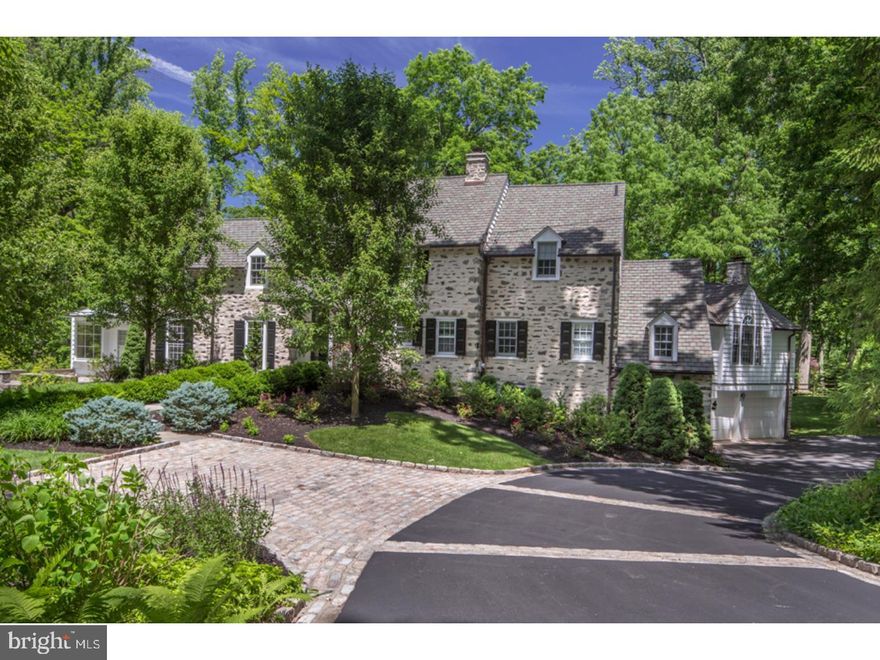 UPDATE: Taxes for 2018 $24,714.65! Enveloped in nature on picturesque grounds privatized by tall evergreens, this magnificent Center Hall Colonial close to all Main Line amenities makes you feel a world away. A stately Walter Durham house graced by a stone exterior with "barn dash" mortar treatment, 357 Laurel Ln has been impeccably maintained and expanded to include a stunning architect Fred Bissinger-designed addition with a family room flowing into the kitchen, and adding a 2-car heated and cooled garage to complement the existing 2-car heated garage. Nestled on .84 pristine acres graced by landscape lighting and irrigation in the desirable estate neighborhood of Northside Haverford. Current owners have enjoyed many happy occasions in home's sophisticated yet intimate setting, from the front porch/deck for outdoor family time to the spectacular yet welcoming interior with rooms for every purpose. Oversized windows invite abundant light. Random-width pegged floors, beautiful moldings, built-ins and 4 fireplaces evoke timelessness and charm.   A garden-lined walk guides you toward a transverse reception hall entrance with a powder room, from which you step down to the living room with wood-burning fireplace, study with built-in bookcases and stone walled terrace. Entertain in the formal dining room brightened by a large bay window. The pantry area leads to a spacious back deck and stairs to the lower level. Your top-of-the-line kitchen is a dream for the discerning chef with an adjoining breakfast area overlooking the rear yard and a fabulous family room with Palladian windows, a dramatic cathedral ceiling, brick gas fireplace and wet bar for the ultimate holiday celebrations. Also conveniently on the main level is a bedroom and full bath for guests, au pairs or in-laws plus a laundry room.  Up the main staircase awaits your heavenly master suite with a step-down bedroom, fireplace, newer spa bath, 2 closets and room-size walk-in with built-in dresser island that can be converted back to a BR. Two additional BRs with adjoining baths and generous storage areas comprise the upper level. Watch favorite movies in the downstairs entertainment room warmed by a huge fireplace, completed by a full bath, storage/utility closets and access to the 4-car garage. Near the train station for an easy commute; quick 20/35-minute drive to King of Prussia and Center City respectively.
