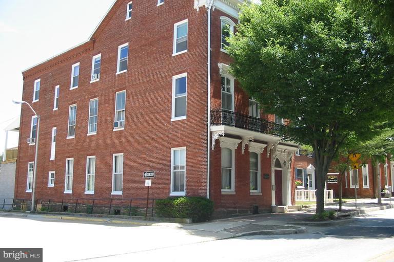 Great location on Historic Downtown Main st Westminster business district close to everything with in walking distance to stores,shops,Gov't complex,parks,tennis cts,play ground,gym, located on 3rd floor (Top floor) 1 bedroom apartment that Landlord Pays everything except for Electric,high ceilings,large windows, nice and bright sun lit rooms,Private off street parking lot,Hurry! these go fast