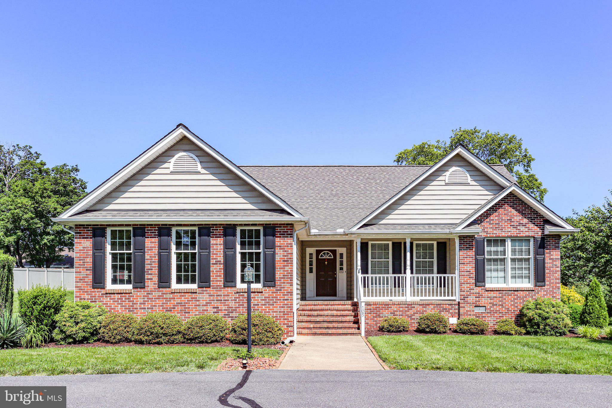 Nestled just a stones throw away from the lush green edges of the Fredericksburg Country Club, this beautifully appointed one-level offers low level maintenance living in a serene, golf-side community. The home features a timeless brick façade blended with lap siding, mature landscaping, and circular driveway.
Inside, you will find beautiful hardwood flooring, cathedral ceilings, and tons of natural light. The open-concept layout provides tasteful finishes, large windows, and wonderful light-filled atmosphere. The rear addition has glass French doors overlooking the slate patio and beautiful landscaping.
The primary suite includes hardwood flooring, a large sitting room with built-ins, vaulted bedroom, and a well appointed primary en suite bathroom. The en suite bathroom features include a soaking tub, shower, dual vanity and a walk-in closet. Two additional bedrooms, a full bathroom, and a laundry room complete the well-designed floor plan.
A side load garage, with generous cabinet storage provides entry to the breakfast nook. Well appointed shed with electricity provides ample storage for outdoor lawn equipment. The roof and a new Honeywell whole-house generator replaced & installed in 2024. Short golf cart ride to the FCC clubhouse and pool.