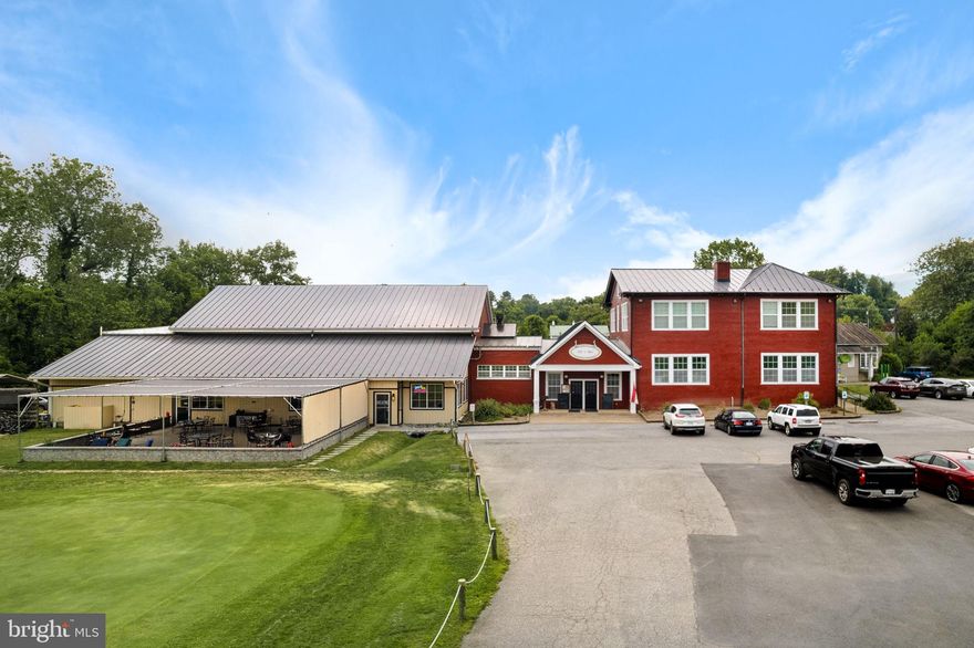 Don't miss this opportunity to own the iconic Schoolhouse building in the heart of Sperryville, VA.  Over 50 years since last listed! This prime location at the corner of Routes 211 and 522 is currently home to a charming southern fare restaurant, vocational school, wine shop, art galleries and more. The historical Sperryville School was built in 1905 and sold by the School Board in 1968 when the new Rappahannock County High School was completed. The building then found new life as the Sperryville Emporium and became the largest business in Sperryville in the 1970s and 1980s.  Prime location, 13,000+ sq. ft. commercial building, Thornton River frontage, generous parking lot. This property is truly one of a kind, in beautiful and desirable Rappahannock County. Current annual rental income, when fully occupied is $180,600.00.  Recent improvements include a 50KW solar array, new Weill McClain boiler, and complete exterior paint job. The current solar array roughly reduces the building's utility cost by $10,000 per year. Lease information, profit and loss statements and utility information can be provided to qualified buyers.