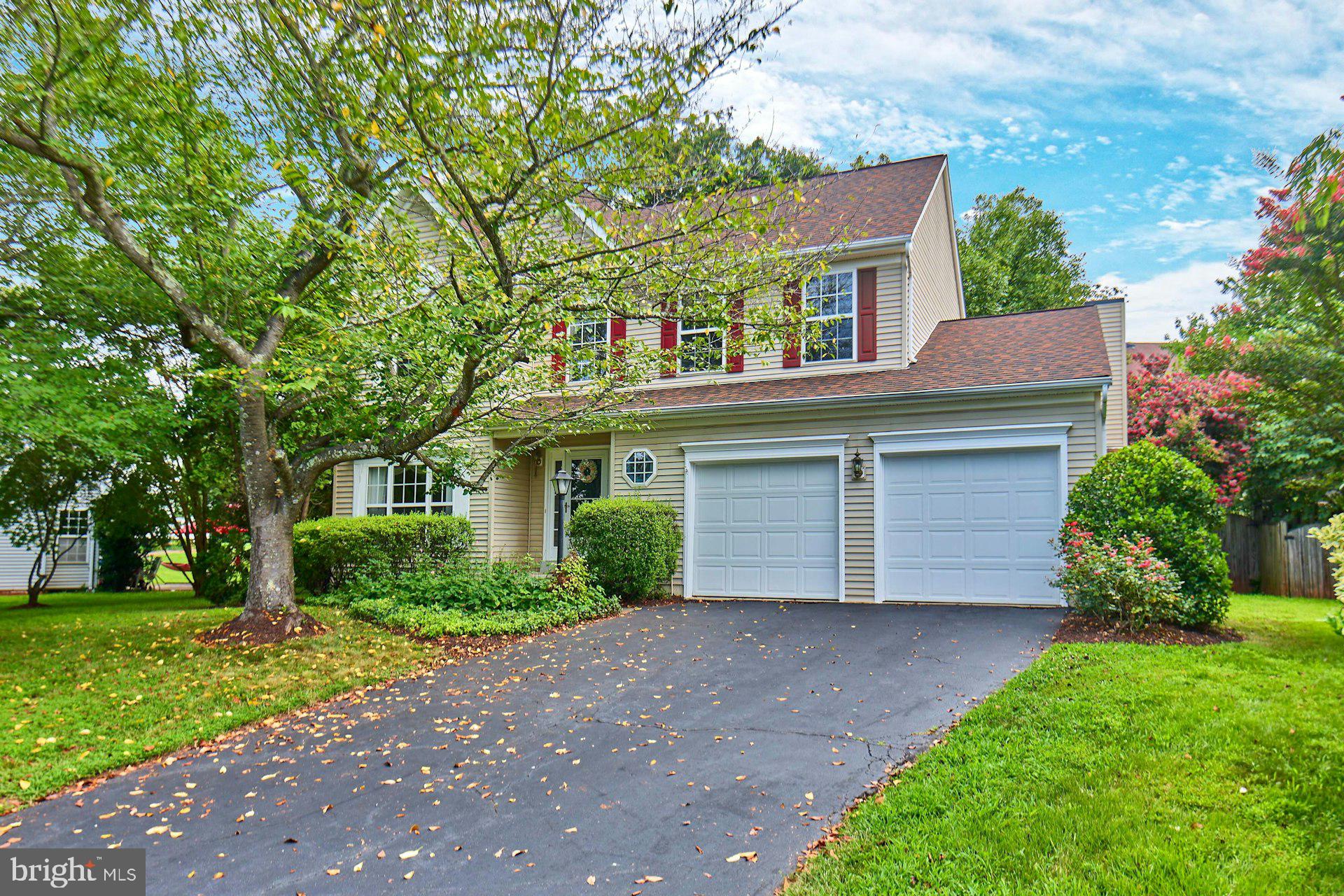 Beautiful Colonial with Heated Saltwater Pool in Historic Manassas! 3,000 sq ft on three finished levels plus a 2 car garage . Easy access to shopping, schools and major roads, yet privacy abounds.
Tucked away on a serene cul-de-sac in the heart of historic Manassas, this exquisite three-level Colonial blends timeless charm with modern comfort. Set on a beautifully landscaped lot, the property features a heated saltwater gunite pool, with pebble tech surface and complete with its own WATERFALL, creating your own private backyard oasis—ideal for entertaining or unwinding in style year-round. Custom Cover, Pump Replaced 2024, Salt Water Cell Replaced 2023, Polaris Cleaner Pump Replaced 2024.
Inside, you'll find three finished levels thoughtfully designed for everyday living and hosting. The main level showcases gleaming floors in the Family Room and brand-new plush carpeting in the formal Living and Dining Rooms. The Chef’s Kitchen is a standout with granite countertops, stainless steel appliances, and fresh designer paint in Benjamin Moore’s Pale Oak—all opening to the adjacent Family Room, complete with laminate floors, a cozy gas fireplace, and a ceiling fan. From here, step directly onto the expansive deck that overlooks your lush backyard retreat.
Upstairs, the spacious Primary Suite features a walk-in closet and private bath with Shower and Soaking tub.. Two additional bedrooms and a well-appointed full hall bath complete the upper level.
The fully finished lower level offers a large recreation room, a wet bar with sink and cabinetry, a full bath, a dedicated storage room, and walk-up access to the backyard—perfect for game nights or casual gatherings.
Step outside to enjoy the professionally landscaped, fully fenced backyard with mature trees and shrubs for added beauty and privacy. The freshly painted deck and patio frame the stunning Gunite POOL, making this outdoor space the ultimate destination for relaxation and fun. Surrounded by a fence and matured trees, this is truly paradise and a private oasis. Plus a Hot Tub! Pebbletech pool surface, never needs painting & resists algae. Roof replaced with architectural shingles in 2016.