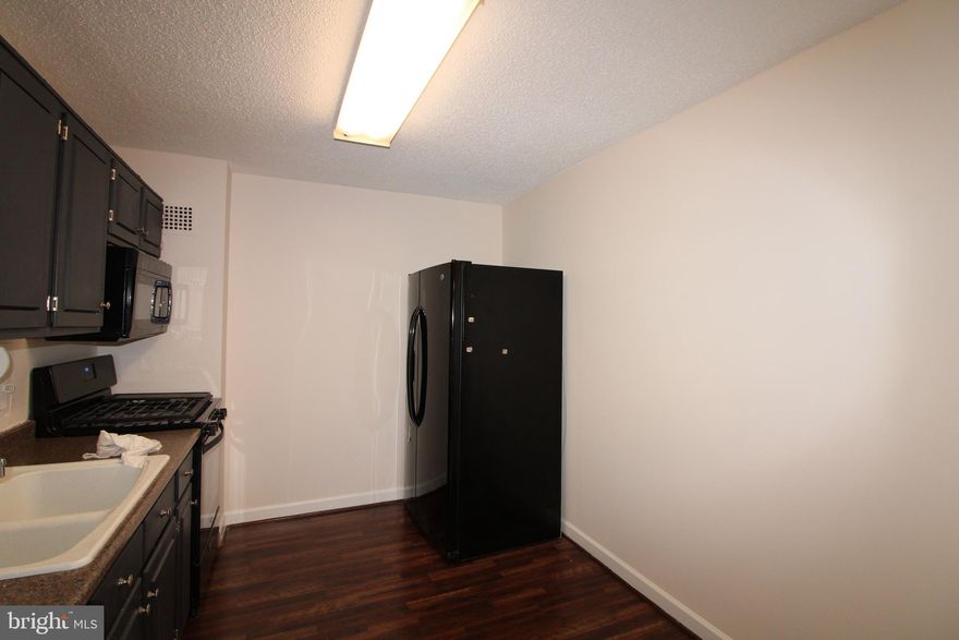 What a rare find, A 2bd/2bath in Alexandria, minutes to the Pentagon and Seconds from Shirlington! Thinking of a full-service building, with front desk, gym, sauna, tennis, basketball, ample parking, and lots of community events? ParkEast is your go-to for everything you need in your forever condo. The apartment is updated with wood flooring, carpeted bedrooms, newer appliances in a spacious kitchen, and so much SPACE. An amazing view will await from the Balcony where you can relax and overlook scenic Alexandria Hills, or parts of Washington D.C.