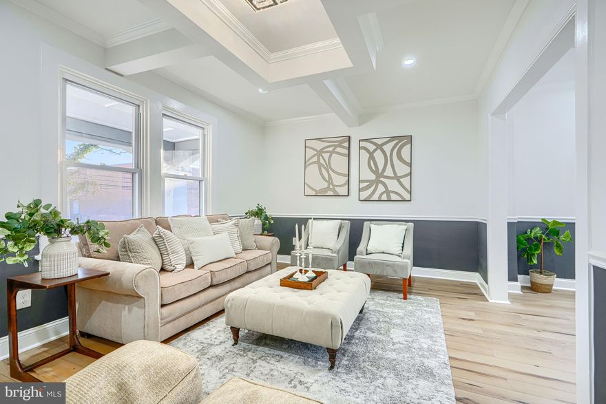 Welcome to 612 Woodbourne Avenue, a spacious and beautifully updated 4-bedroom, 2.5-bathroom home designed for comfortable living and effortless entertaining. Relax on the inviting covered front porch before stepping inside to a bright and welcoming living room, showcasing intricate ceiling details and modern lighting that add character and style throughout. The large gourmet kitchen is a true highlight, featuring granite countertops, stainless steel appliances, a stylish backsplash, and a breakfast bar with additional seating—perfect for casual meals or gatherings. A convenient powder room completes the main level. Upstairs, you’ll find three generously sized bedrooms and a luxurious full bathroom with a jacuzzi tub, creating a spa-like retreat. The fully finished basement offers exceptional additional living space, including a large recreation room, laundry area with washer and dryer, a full bathroom, and a fourth bedroom—ideal for guests or flexible living arrangements. Step outside to enjoy the spacious backyard with a deck perfect for entertaining, along with the added convenience of a garage. This home truly combines space, style, and functionality—don’t miss your opportunity to make it yours!