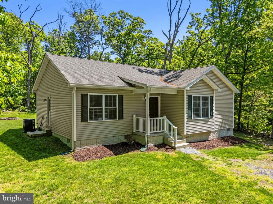 Enjoy easy one-level living in this 3-bedroom, 3-bath ranch-style home in Harpers Ferry. Designed for comfort and everyday convenience, this home features luxury vinyl plank flooring in the living room, kitchen, laundry area, and bathrooms, with cozy carpet in the bedrooms. The eat-in kitchen offers stainless steel appliances, granite countertops, a farm-style sink, and French doors that open directly to the spacious backyard.

The primary suite includes a ceiling fan, walk-in closet, and attached full bath, creating a comfortable retreat at the end of the day. Outside, the large, flat backyard is one of the home’s standout features. Backing to trees, it offers a sense of privacy and plenty of room to create your own outdoor oasis with a future patio, deck, pool, garden, or expanded entertaining space. A firepit and storage shed are already in place, making the yard both inviting and functional.

Surrounded by the natural beauty of Harpers Ferry, this home offers convenient access to outdoor recreation, commuter routes, and transportation while still providing the peaceful feel of a private setting. A wonderful opportunity for buyers looking for single-level living, usable outdoor space, and room to make the backyard truly their own.