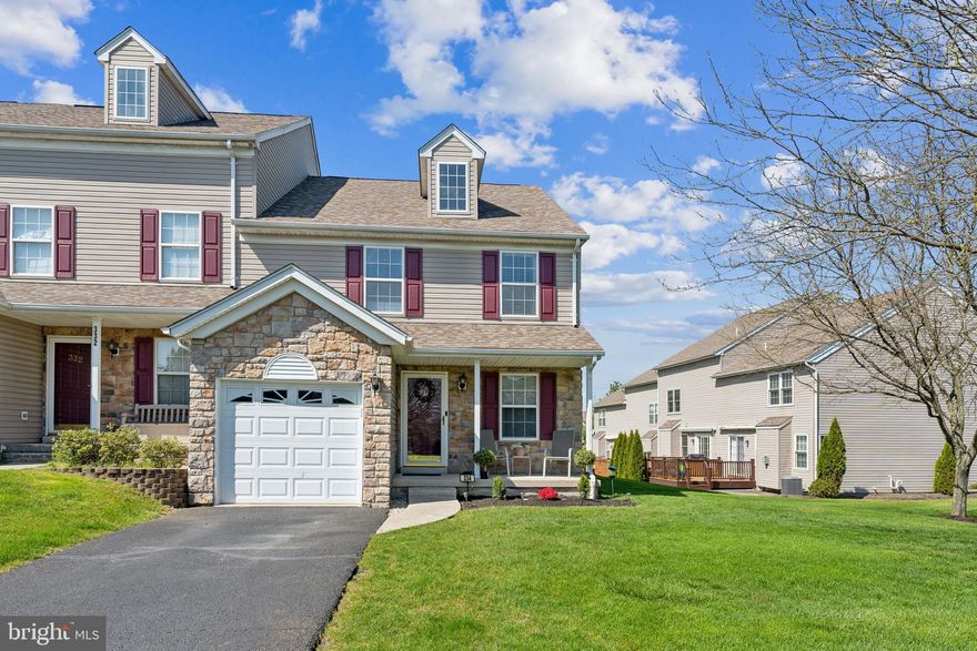 Welcome to this wonderful Two Story end unit Townhouse located in the Community of Bradford Greene.  This home features 3 Bedrooms, 2.5 Baths and a 1 car attached garage.  As you enter this home you are greeted to a Den that is currently being used as a Playroom with a coat closet, Powder Room and door access to the 1 car attached garage.  Down the hall is a beautiful upgraded eat-in Kitchen that has wood cabinets, granite counters, tile backsplash, gas stove, refrigerator and a pantry.  There is an island with a sink, built-in dishwasher, cabinets and drawers for additional storage and working space.  The eating area has a sliding door to a spacious newer Trex deck,  perfect for entertaining and relaxing outside.  The second level has a Primary Bedroom Suite with a walk-in closet that has custom built-ins.  The large upgraded Primary Bathroom features double sinks with a glass countertop, a spacious stall shower with a glass door.  There are two additional nice sized Bedrooms with double closets.  The Hall Bath has double sinks, tile floor, tub shower combo and a double closet that has the washer and dryer.  The partially finished Basement could be used as an Office, Playroom or as additional storage space that has vinyl flooring.  There is a newer Tankless water heater located in one of the closets.  The HOA covers the Common Area Maintenance, Management, Lawn Maintenance, Trash, Snow Removal, street lights and the Tots Playground.  There is also a walking path.  This home is light and bright and ready for the next owner!