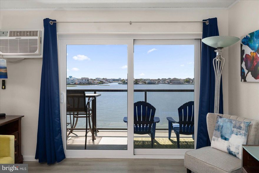 WATERFRONT PARADISE!!  Check out this newly renovated home on the Open Bay!  Gorgous Views and Sunny Southern Exposure allow you to enjoy this property in every season.  Owners just renovated Luxury Vinyl Flooring throughout, Kitchen upgrades include All New Stainless Steel Appliances, Waterfall Edge Marble Counter Tops, updated bath with new cabinet and shower install plus updated furnishings and designer ceiling fans.  The large living room with sliders open on to balcony with beautiful views.  This condo is perfectly situated in the middle of the building away from elevators and perfect level to the water.  The Harbor Sails offers Outdoor Pool, Tennis Courts, Kayak Storage and Water Access.   Just 3 blocks to the ocean at crosswalk on 116th St and close to groceries, shopping, restaurants and Carousel Hotel with free Family Summer Fun.