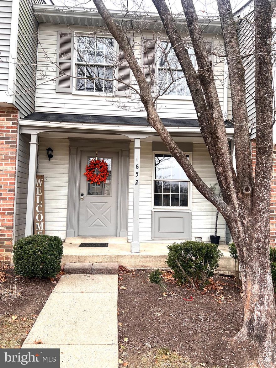 Property Sells AS IS.  
Location is everything—and this home delivers. FHA APPROVED
Situated in the desirable Devils Reach community, this charming home offers exceptional convenience without the noise. Just minutes to I-95, Route 1, Old Bridge Road, public bus lines, and less than 5 miles to the commuter lot. Shopping centers are within walking distance, yet the home remains tucked away and peaceful. Occoquan Elementary School is literally a 1-minute drive.

This home features 2 bedrooms and 2.5 bathrooms and welcomes you with a cozy front porch—perfect for morning coffee or evening relaxation. Inside, the living room is filled with natural light from a large picture window and flows seamlessly into an open kitchen with space for a kitchen table.

The upper level offers two spacious bedrooms and a full hallway bathroom.

The walk-out basement includes a large full bathroom, a recreation area with a closet, and its own private entrance—ideal for guests and a home office.

Step outside to enjoy the private patio, a great space for entertaining, grilling, or simply unwinding outdoors. With both a porch and patio, this home offers multiple outdoor living options rarely found at this price point.

A wonderful blend of comfort, flexibility, and commuter-friendly living—this one is a must-see.